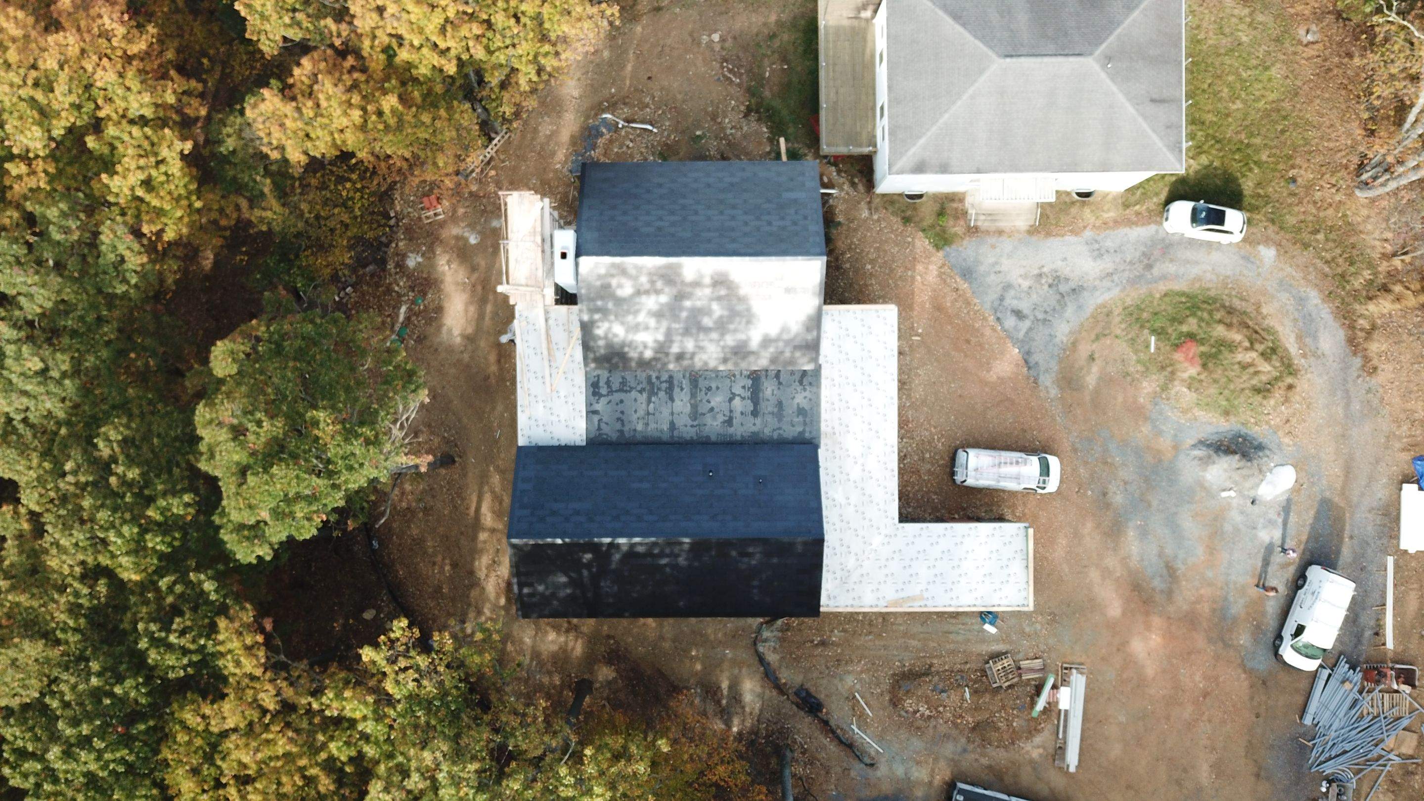 Roof Installation using Tesla Solar Roof V3 by American Home Contractors