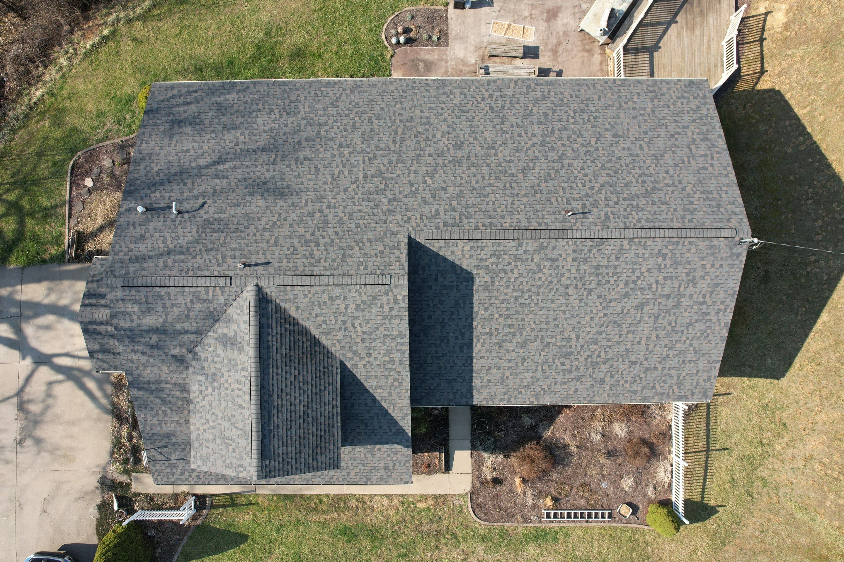 Residential Roofing Installation using GAF Timberline HDZ Charcoal by Rainstoppers Roofing