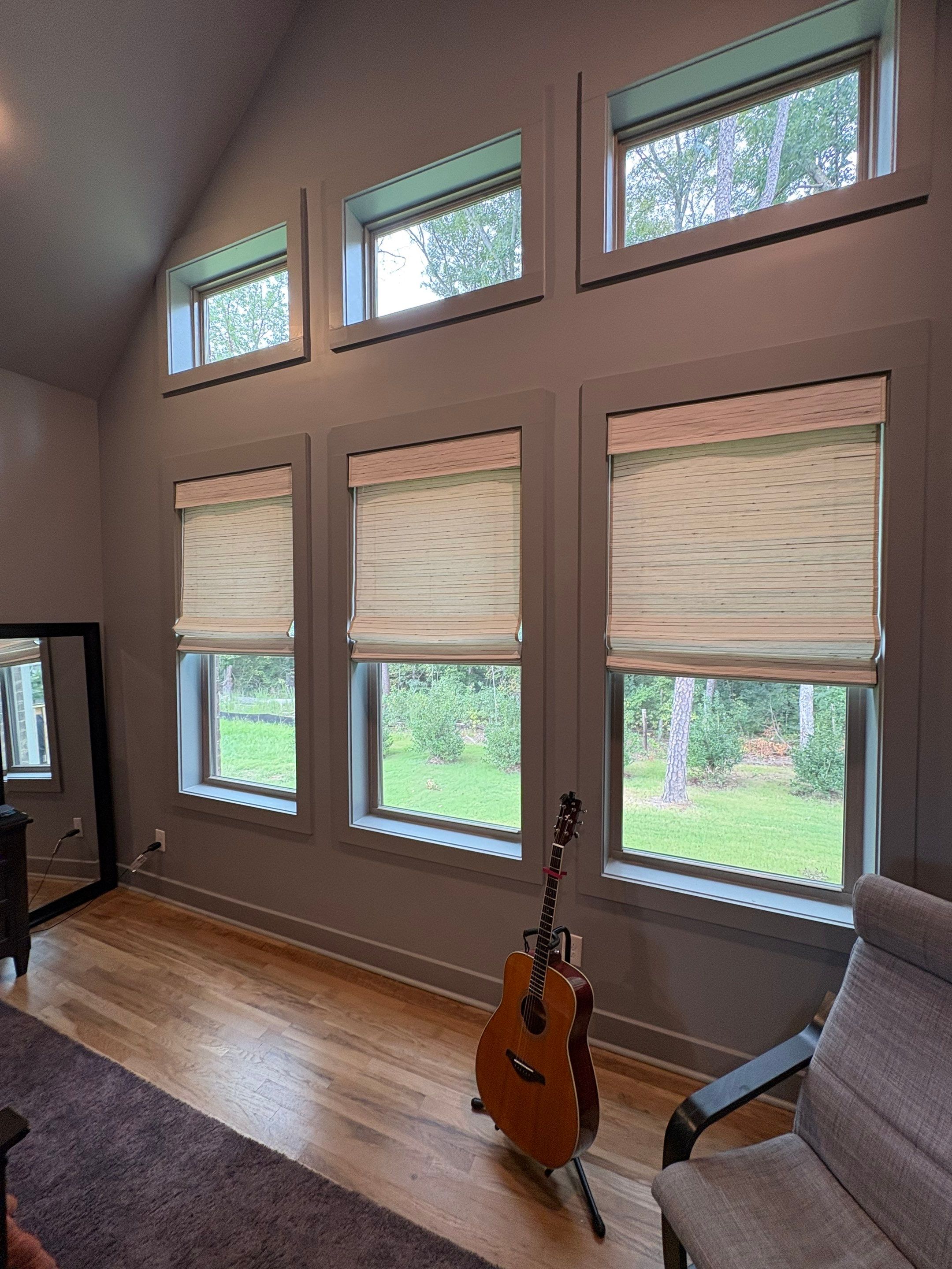 Roman and Woven Wood Shades Project in Huntsville by Blinds and Borders