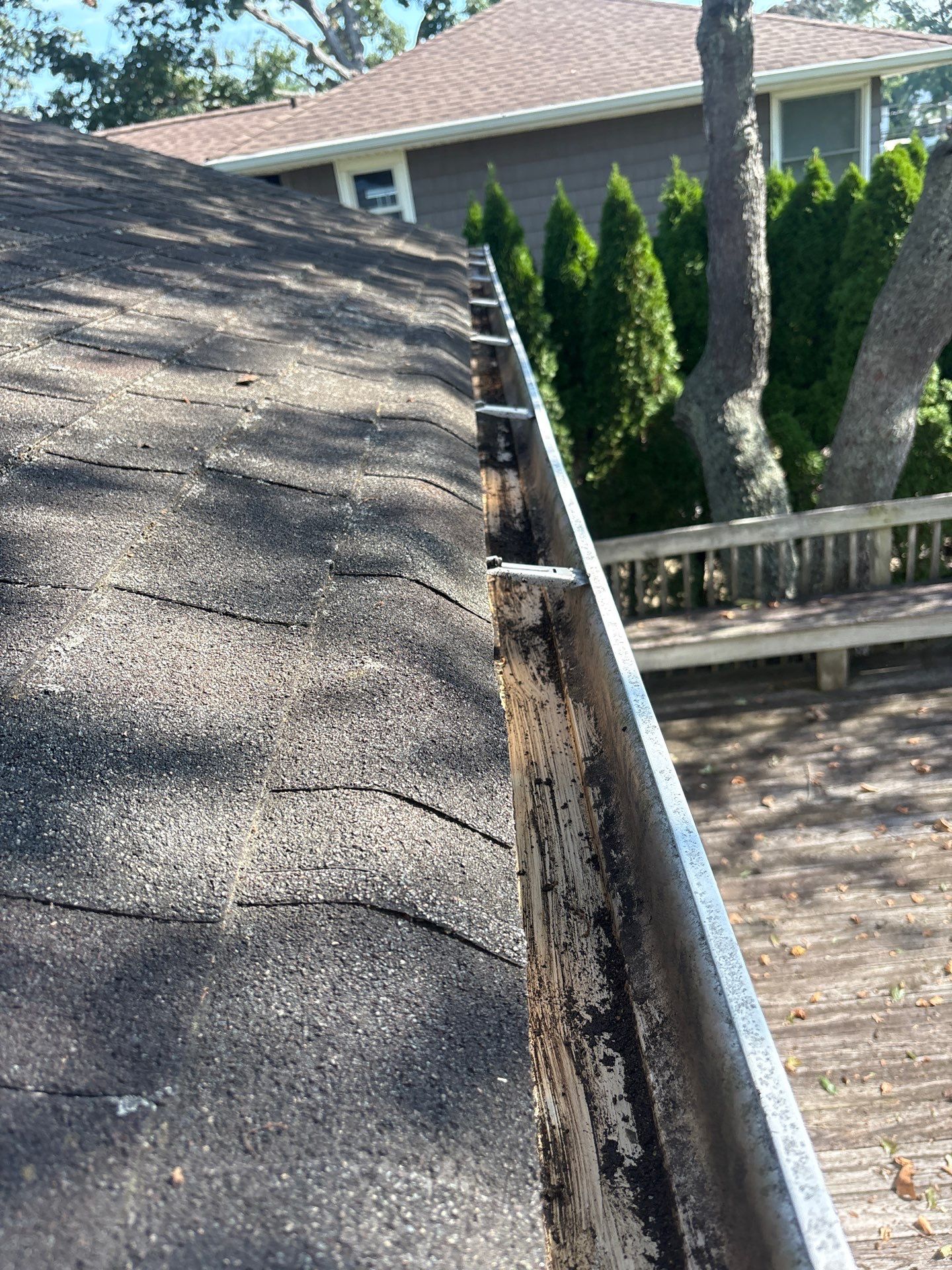 Gutter Cleaning & Debris Removal in Bellmore, NY by Above All Gutters