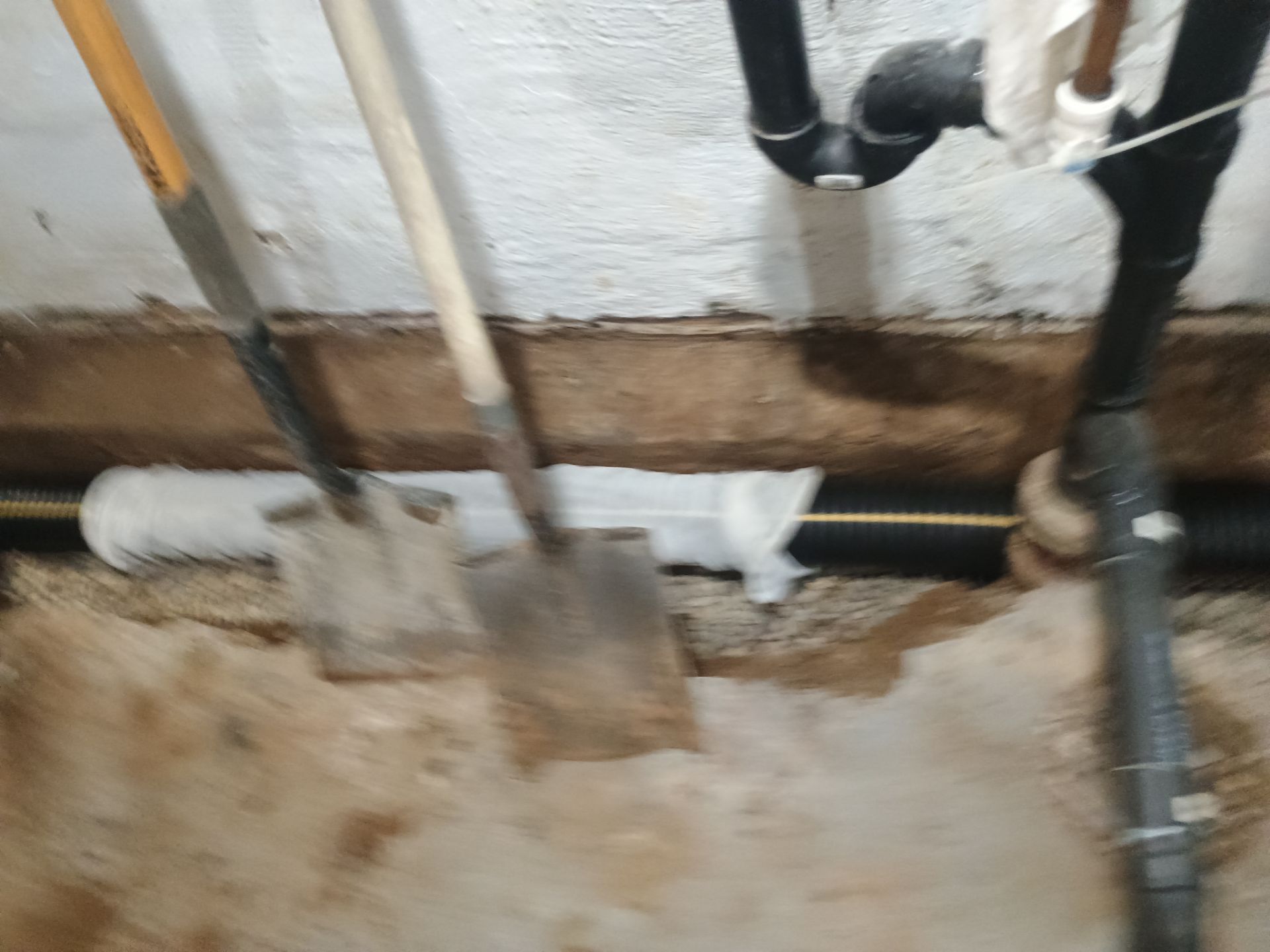 Interior Drain Tile & Yard French Drain in St. Paul, MN by Waterproofing Northeast