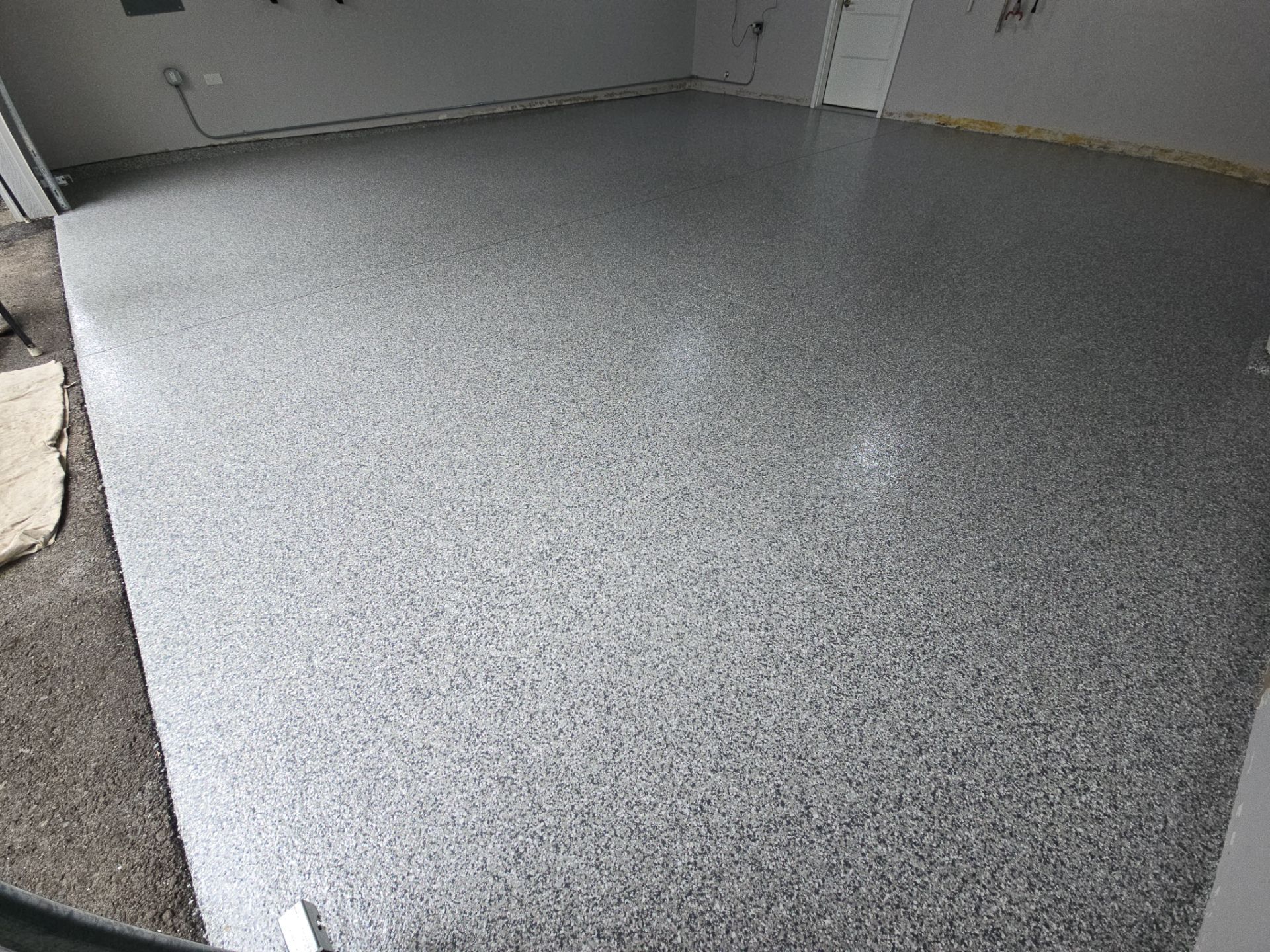 Garage Transformation using Slate Stone by Croc Coatings, LLC