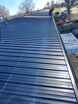 Residential Roofing Installation using Metal