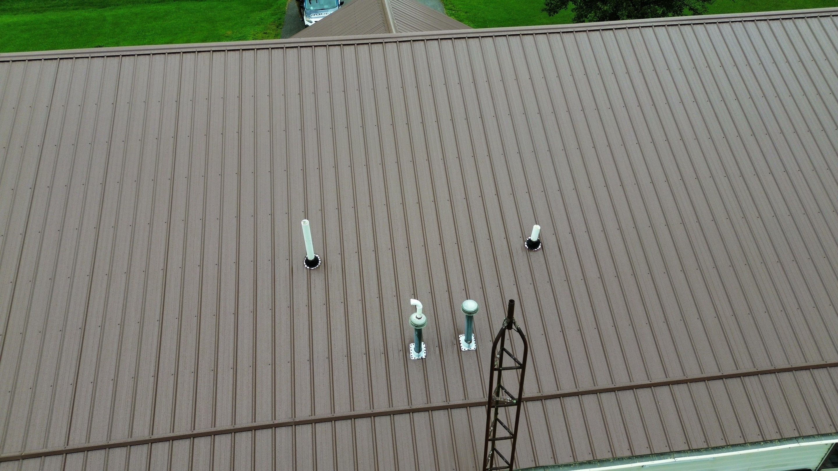 Residential Roofing Installation using Performance Panel Metal - Coca Brown by RoofX 