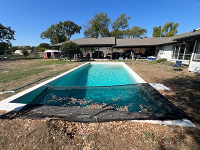 Crisp Geometric Pool with White Coping