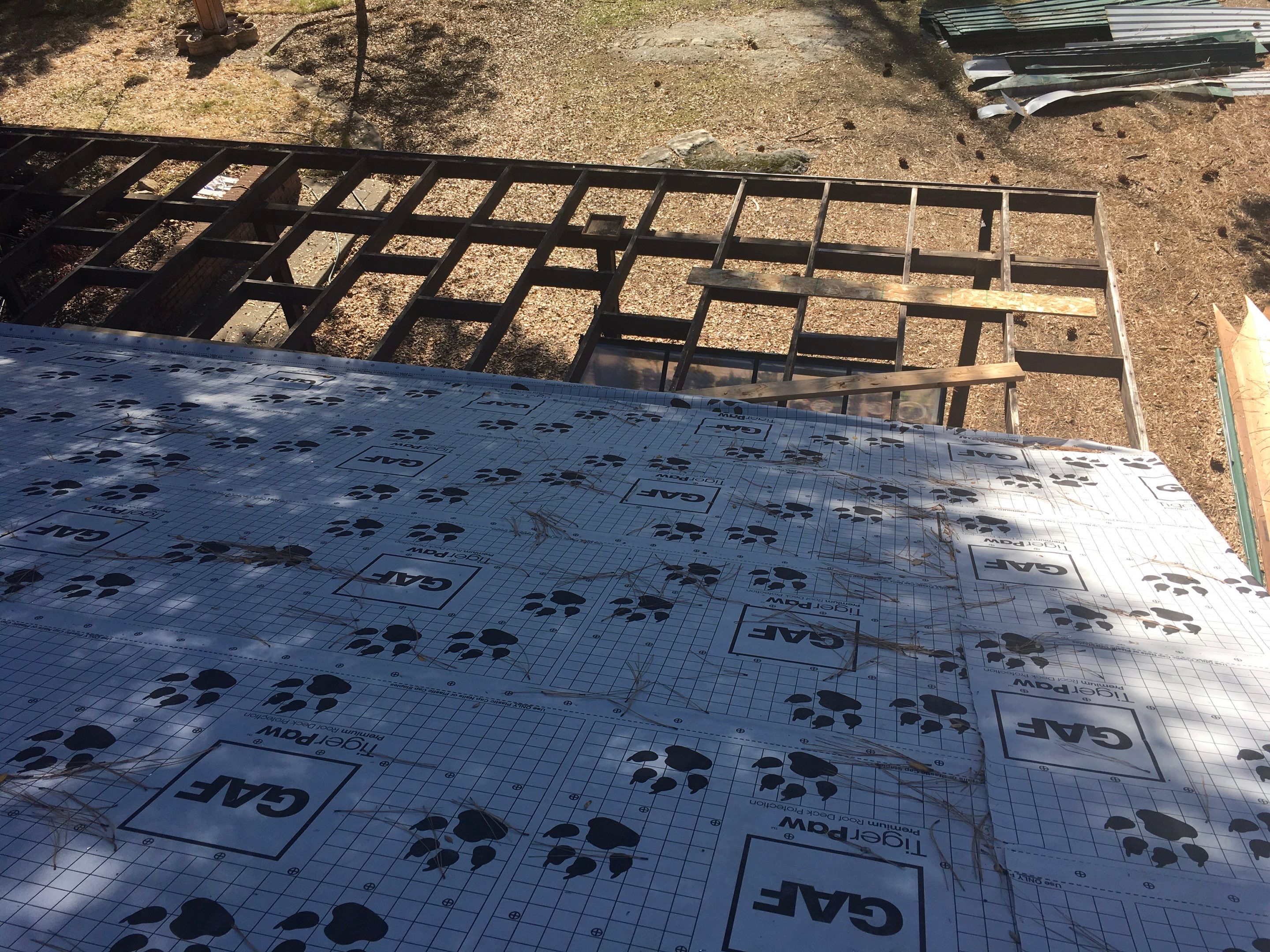 Metal roofing installation using Standing seam metal roofing system by Straight Edge Roofing Inc