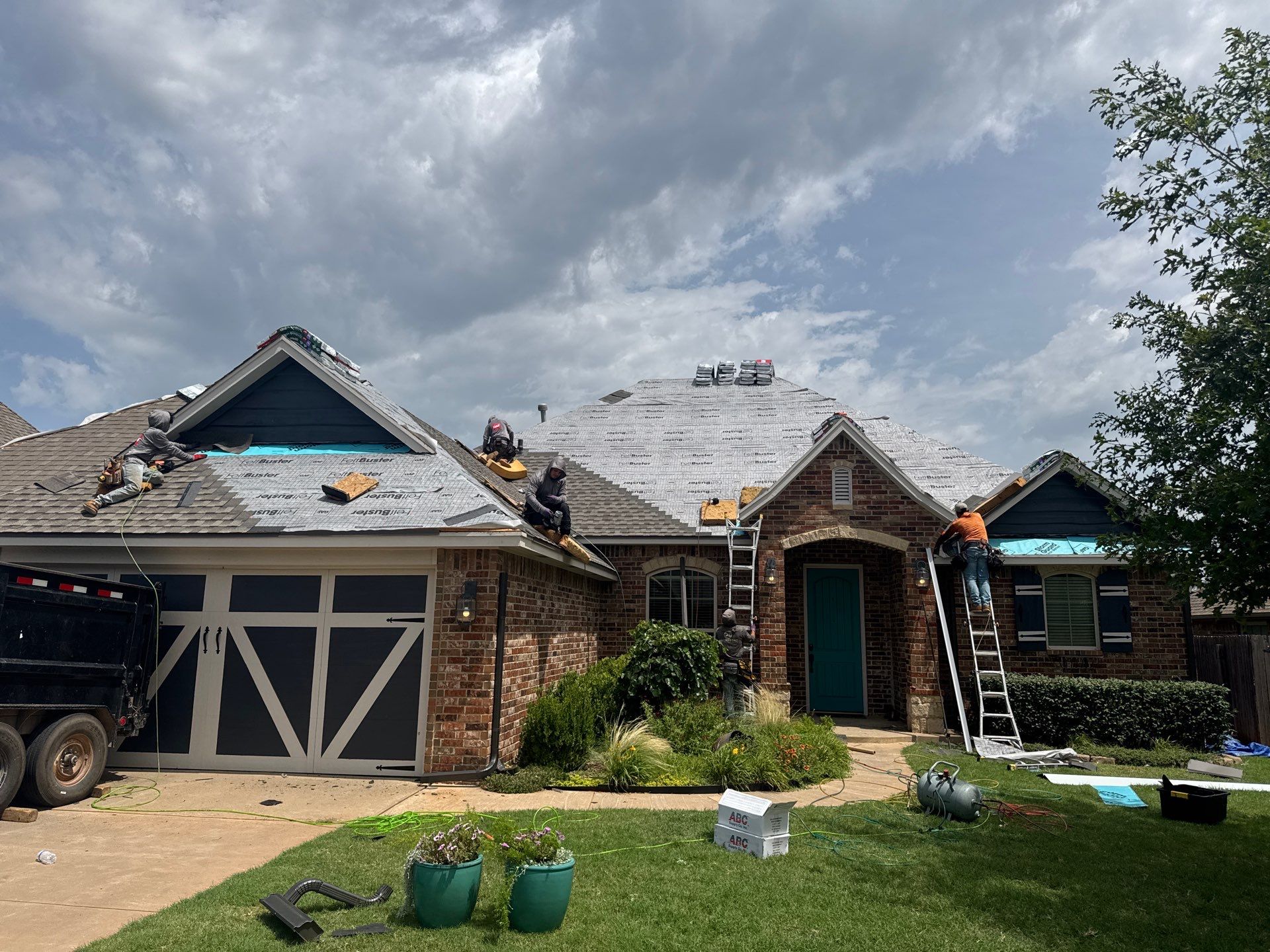 GAF Architectural Shingle Roof Replacement and Decking Repair in Mustang by 5Coat Roofing & Construction
