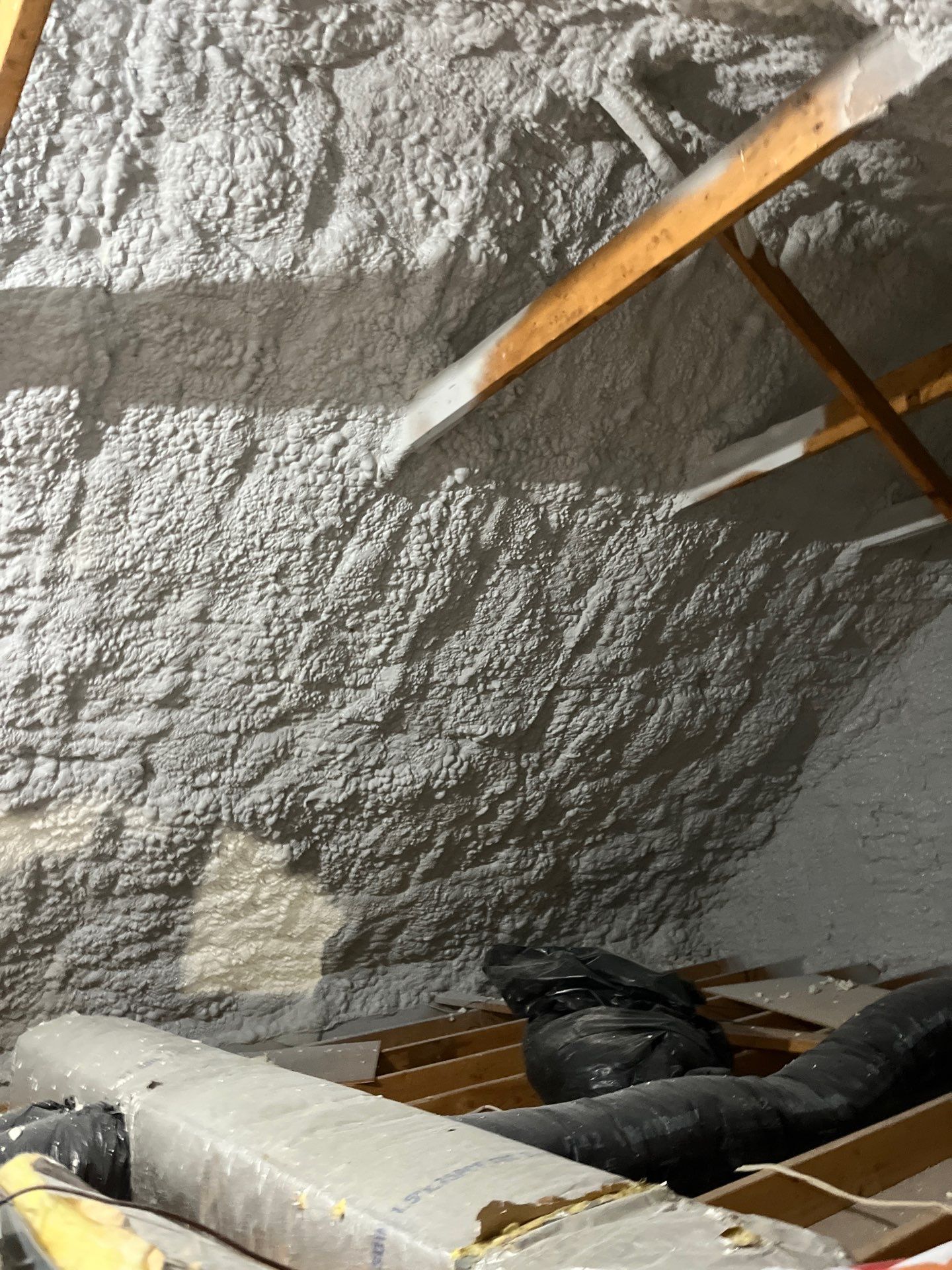 Attic Insulation using open cell spray foam by NYS Foam & Energy