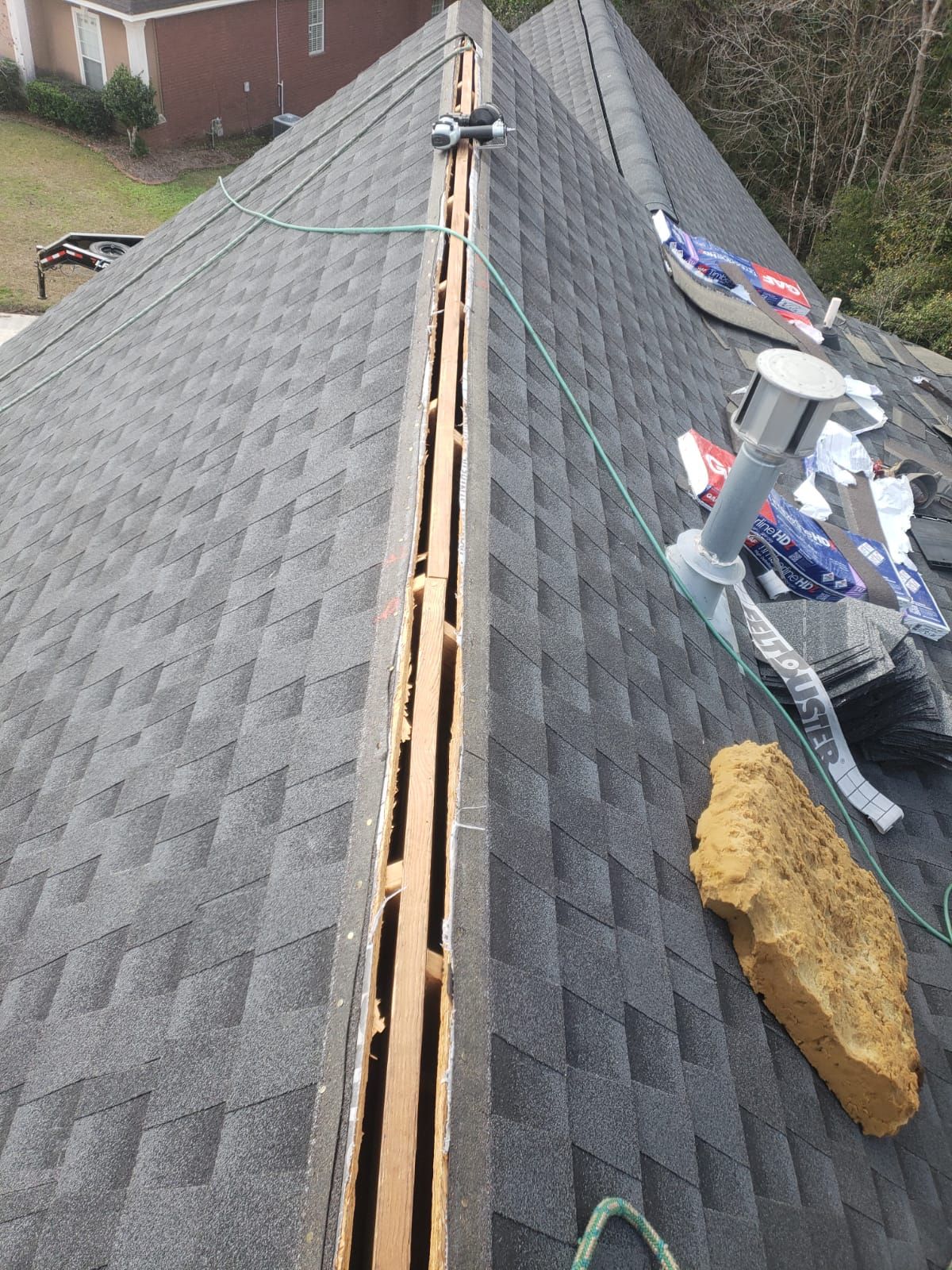 Residential Roofing Installation using Roof Replacement by American Roofing & Construction LLC