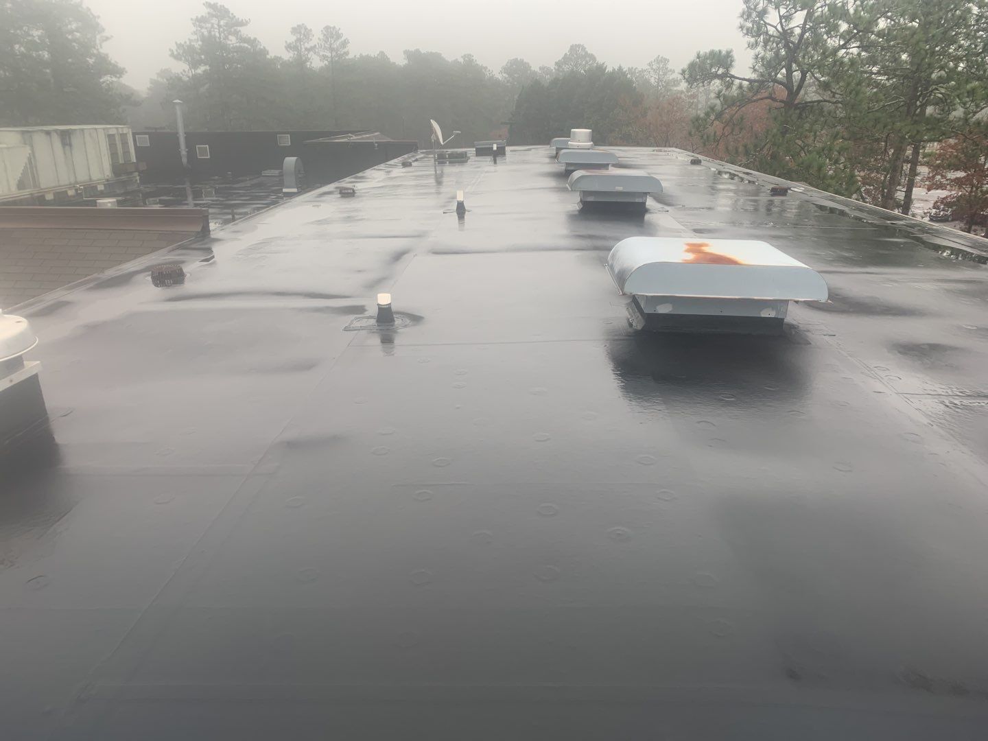 Re Roof (TPO) by American Roofing NC