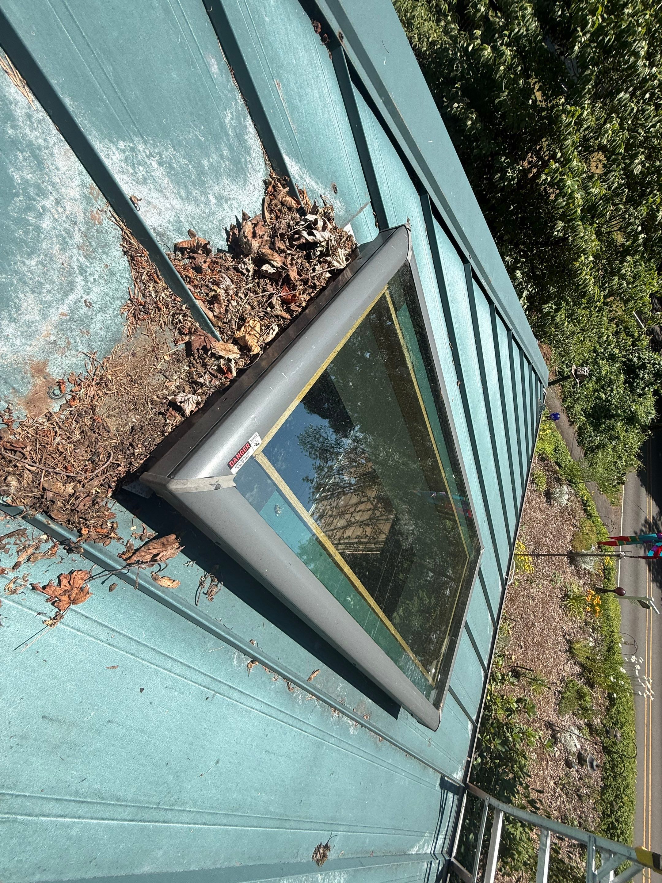 Log Cabin Metal Roof Repair and Skylight Maintenance in Springfield by BEST Roofing & Waterproofing