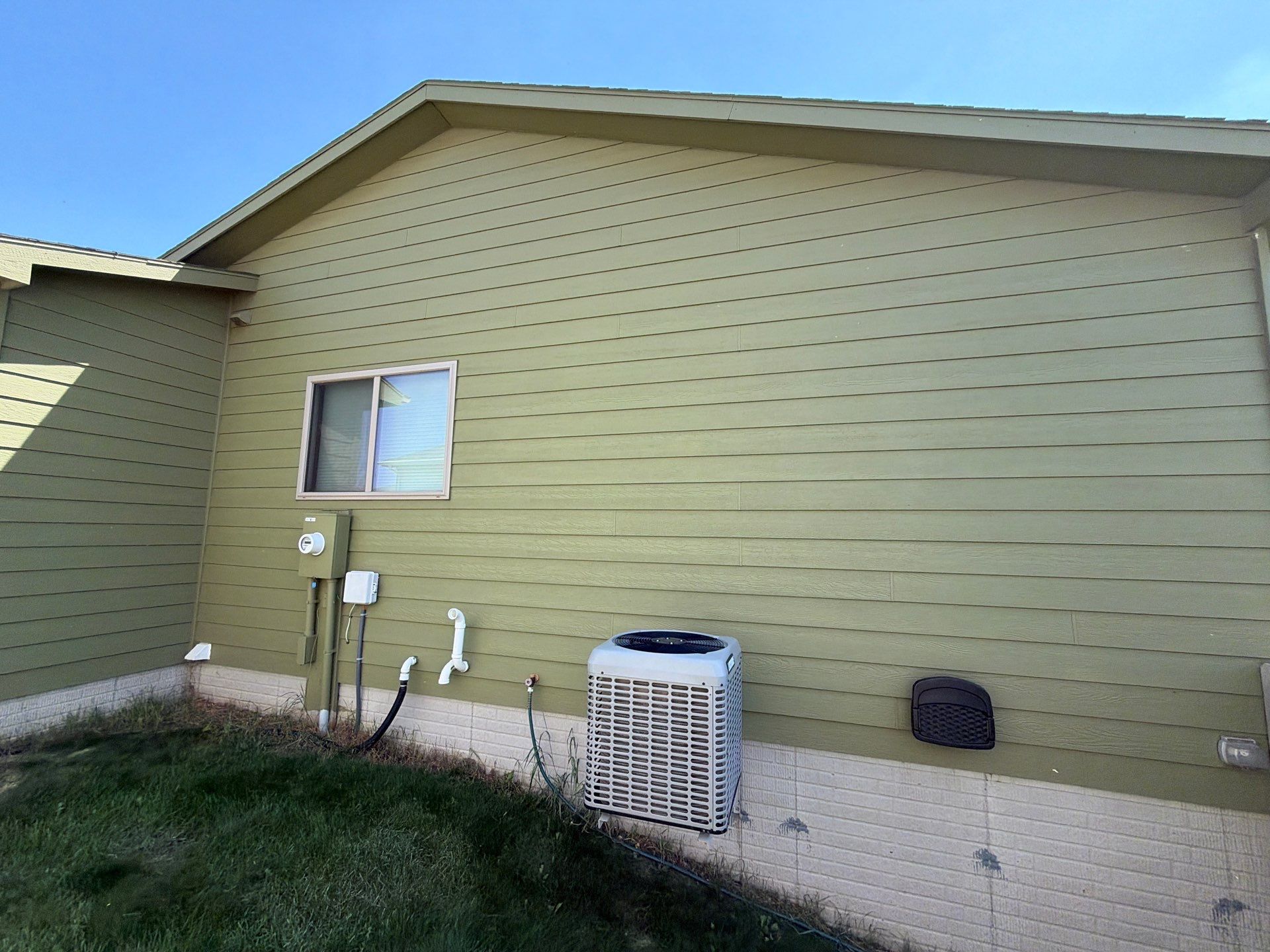 Exterior Painting and Custom Deck Construction in Sioux Falls by Select Painting, Coatings & Garage Cabinets