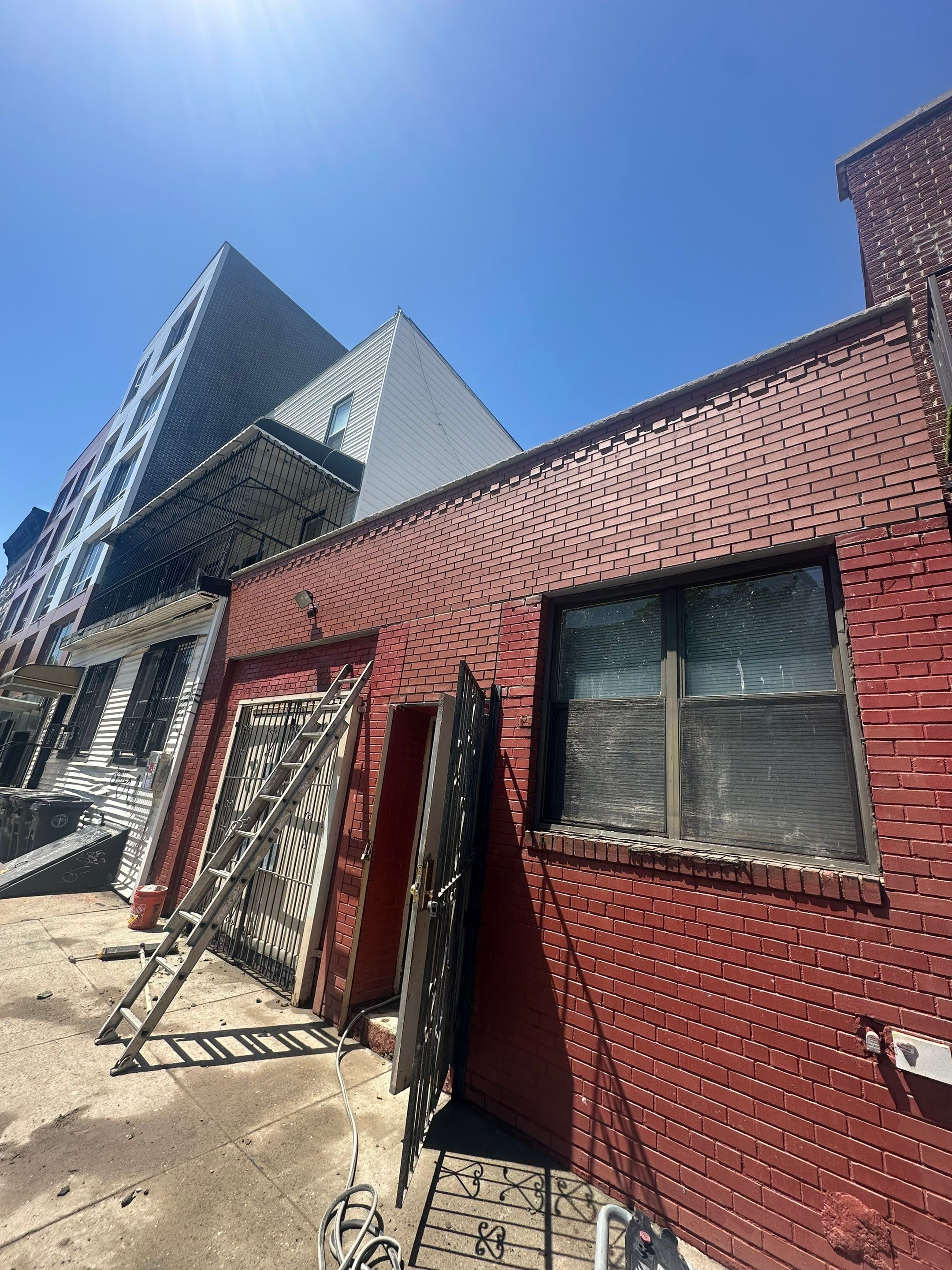 Parapet Rehabilitation  by Medina Design & Development Group