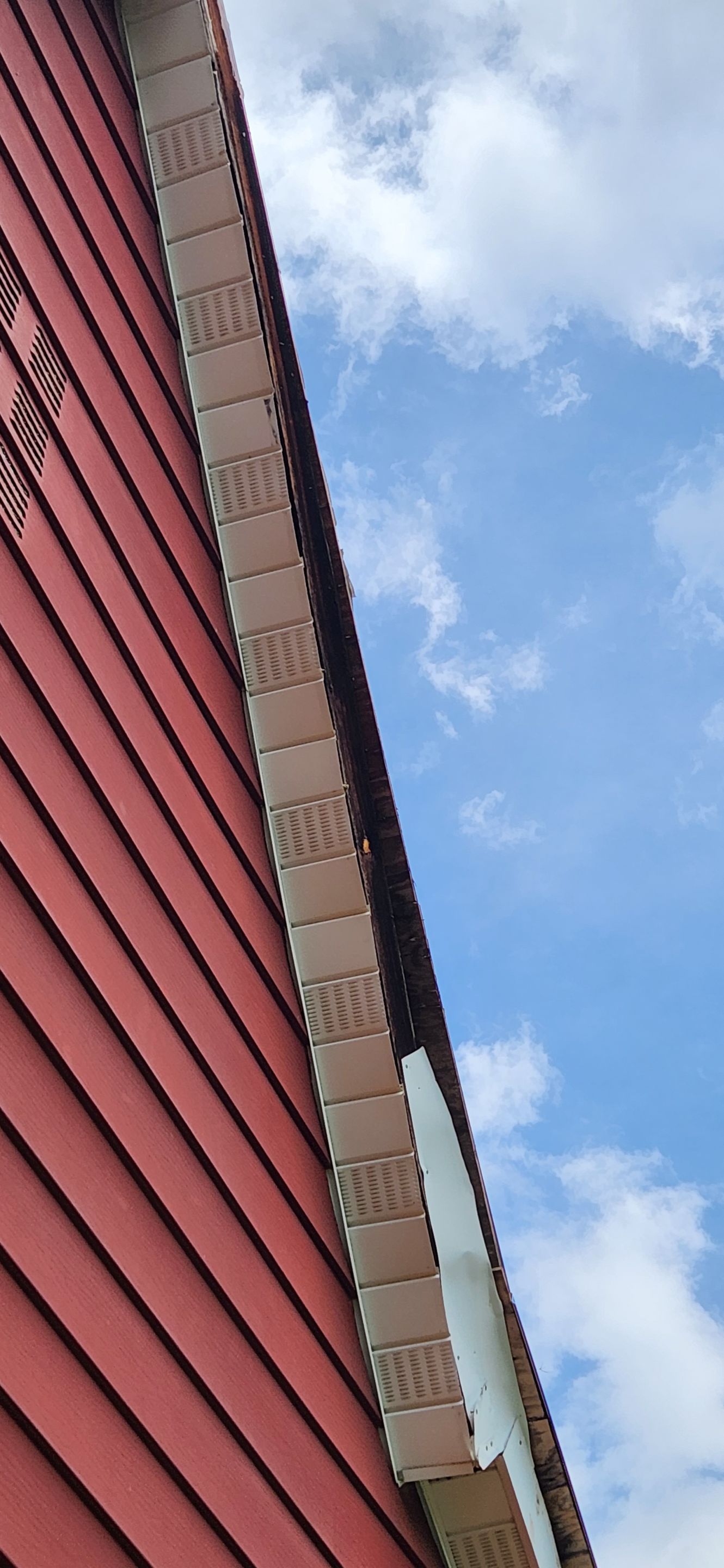 Residential Roofing Installation using 26 Gauge Colored Panels by Hostetler Roofing