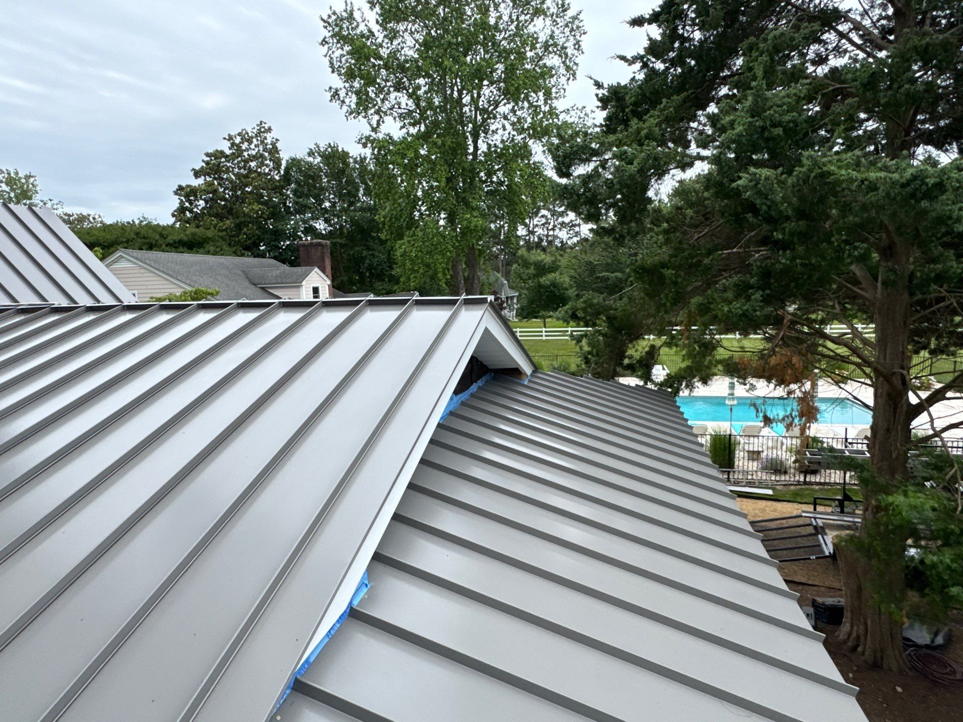 Custom New Construction Metal Roof Installation in Deltaville by Cade Construction