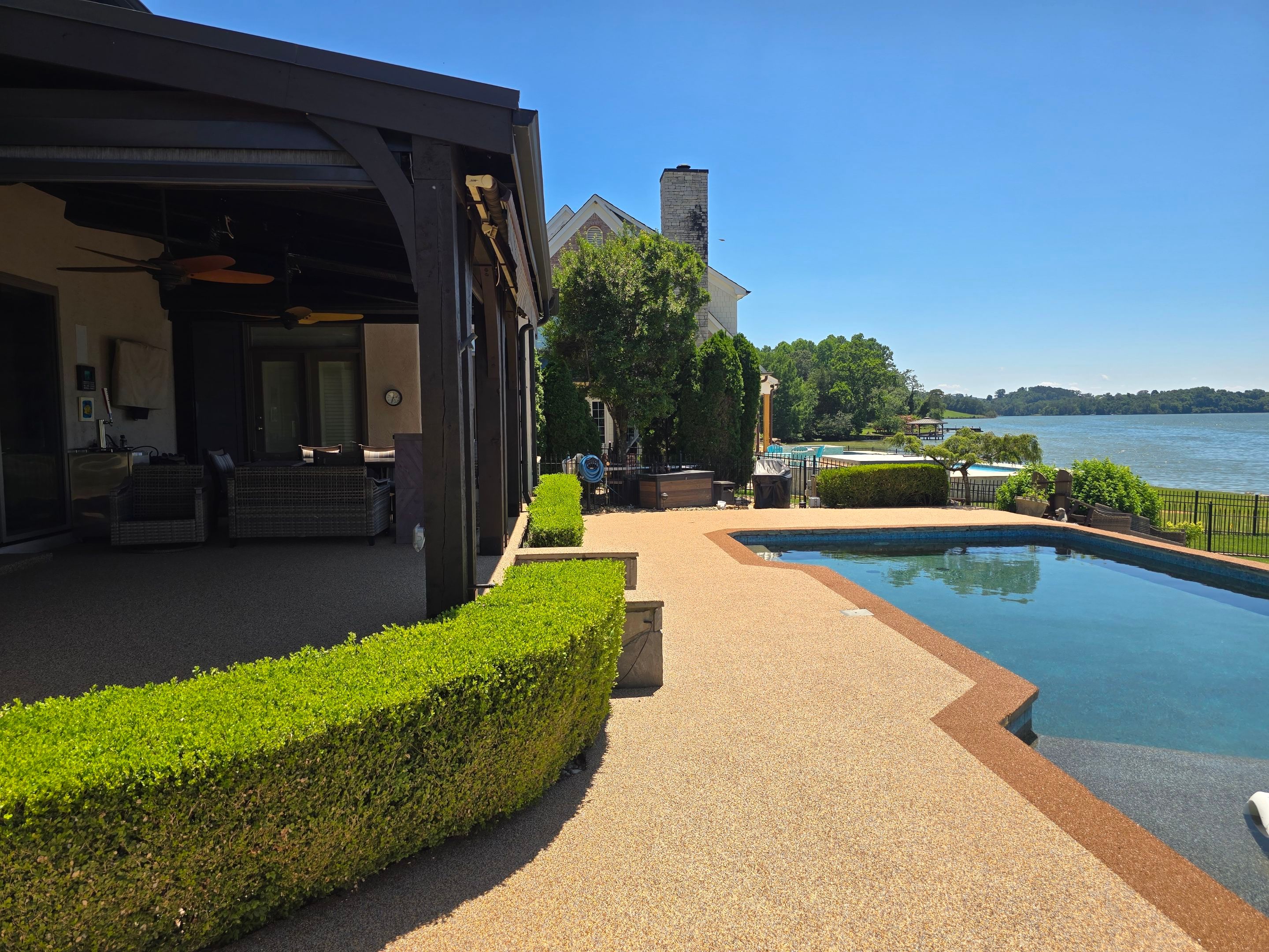 Lakeside Pool Resurface — Sandstone Rubaroc® with Medium Brown Border by Elite Floor Solutions