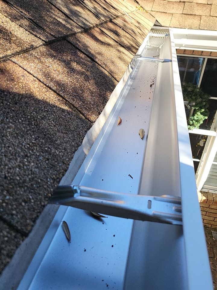 Seamless Gutter Installation using K-Style Seamless Gutters and LeafBlaster Pro Gutter Guards by Gutter Professors