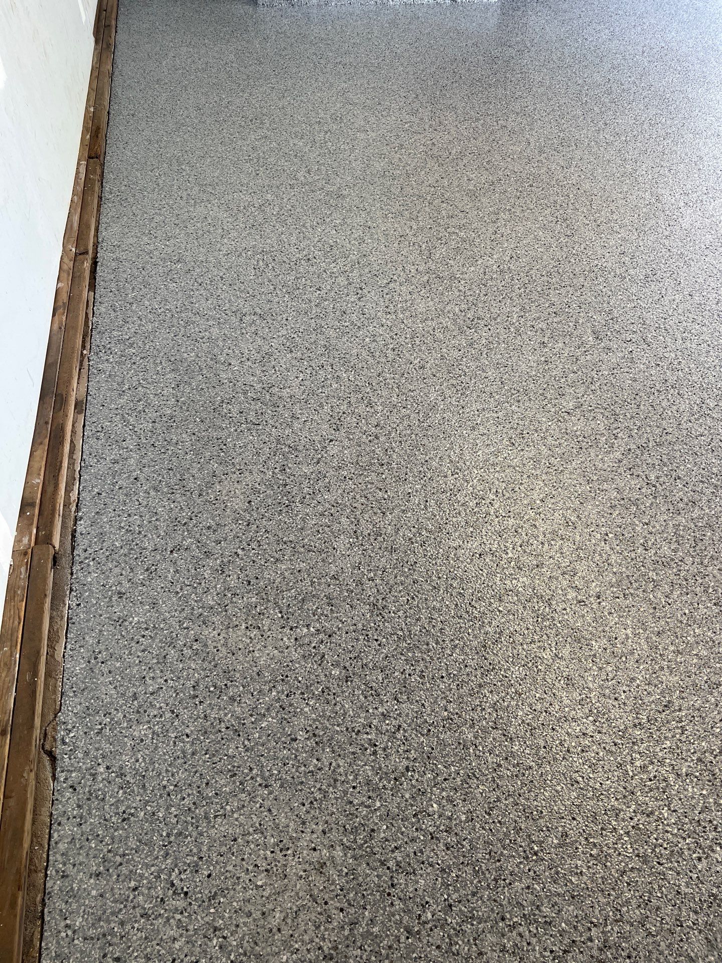 Silverado garage floor coating by NG Masonry & Construction LLC
