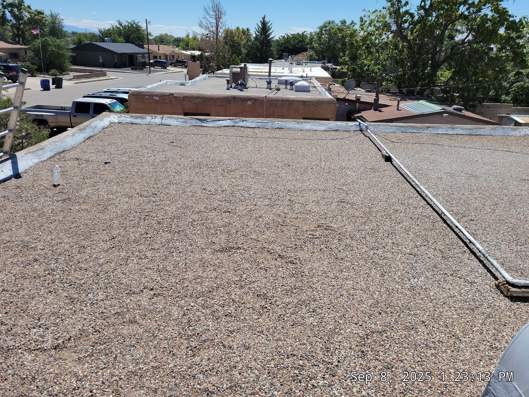 Albuquerque Flat Roof Replacement Using Tan Modified Bitumen Membrane by Doyle Roof Masters Inc