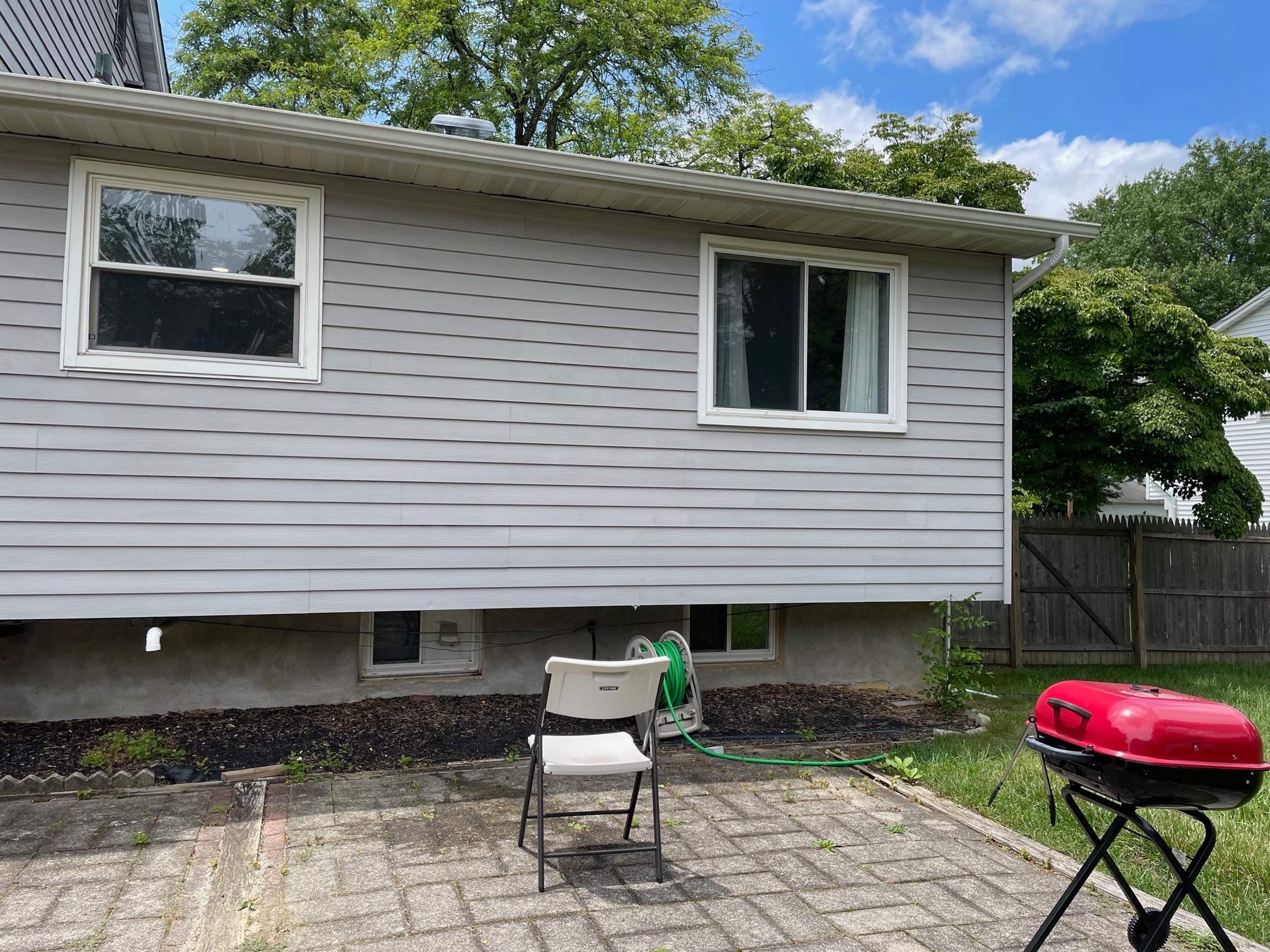 New deck construction and replacement of window with new sliding door  by deck guardian