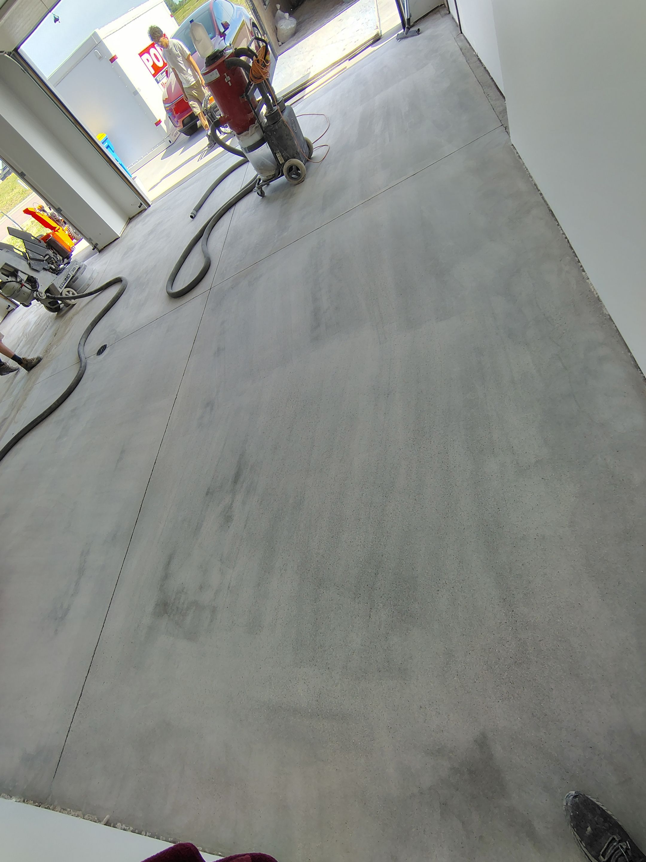 Gray and White Speckled Epoxy Garage Floor Coating in Tea by Select Painting, Coatings & Garage Cabinets