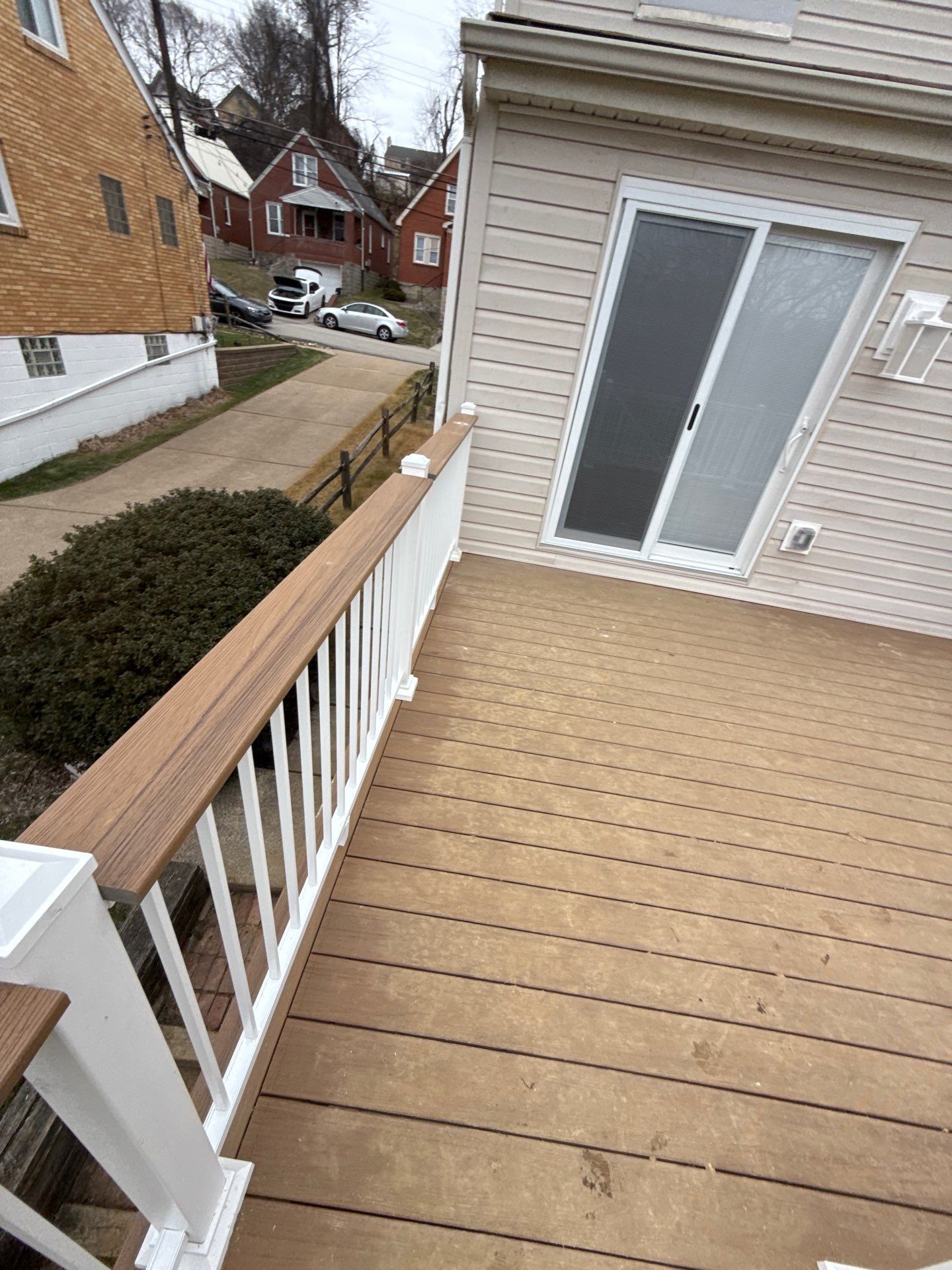 Deck and door by Cousins Roofing Siding & Decks