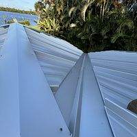 .032 Aluminum 1.5" Mechanical Seam Silver Metallic by Total Roofing System The Metal Roof Experts