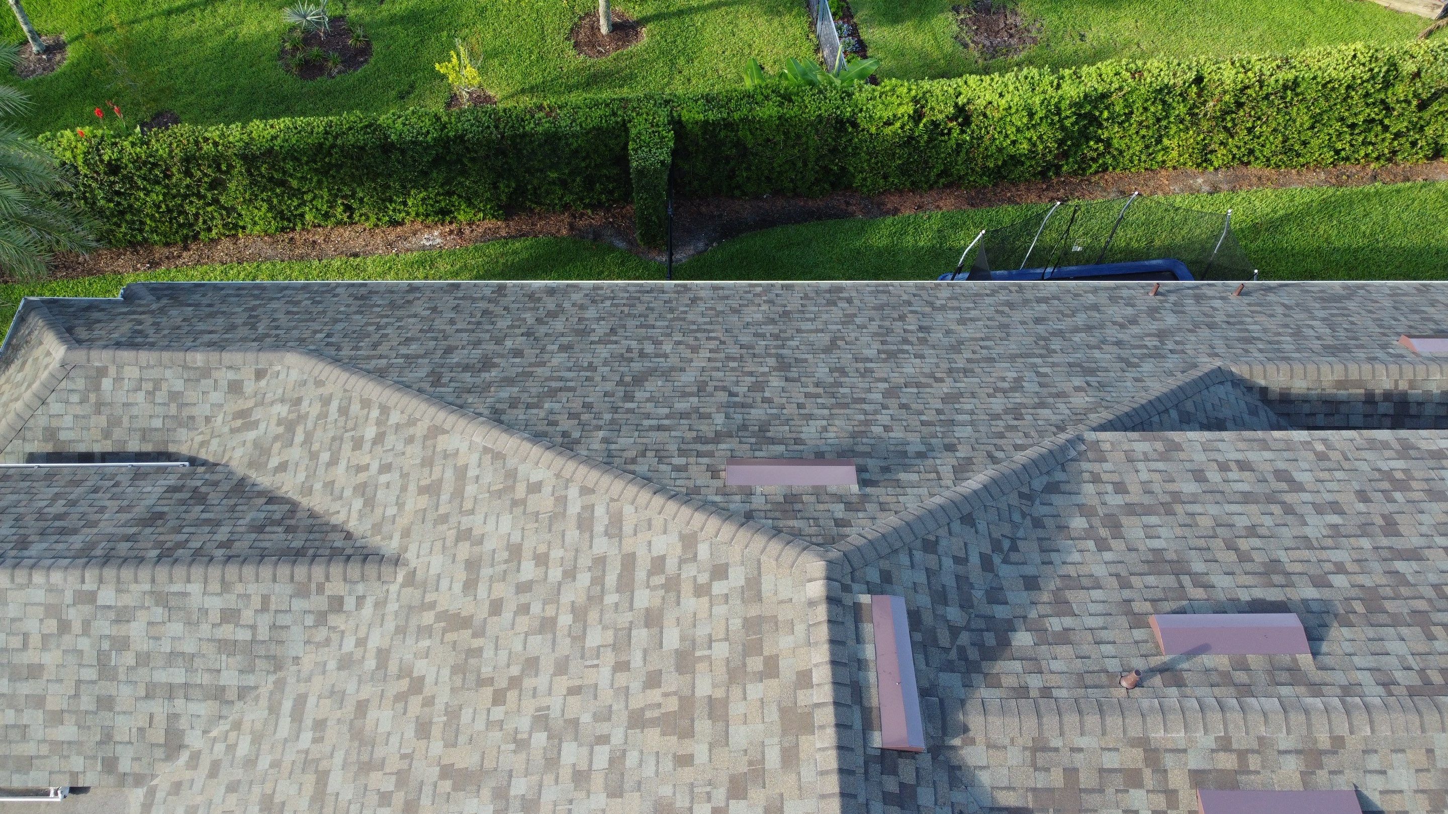 Ponte Vedra Residential Roof Replacement with Driftwood Architectural Asphalt Shingles by Trinity Restoration and Roofing LLC