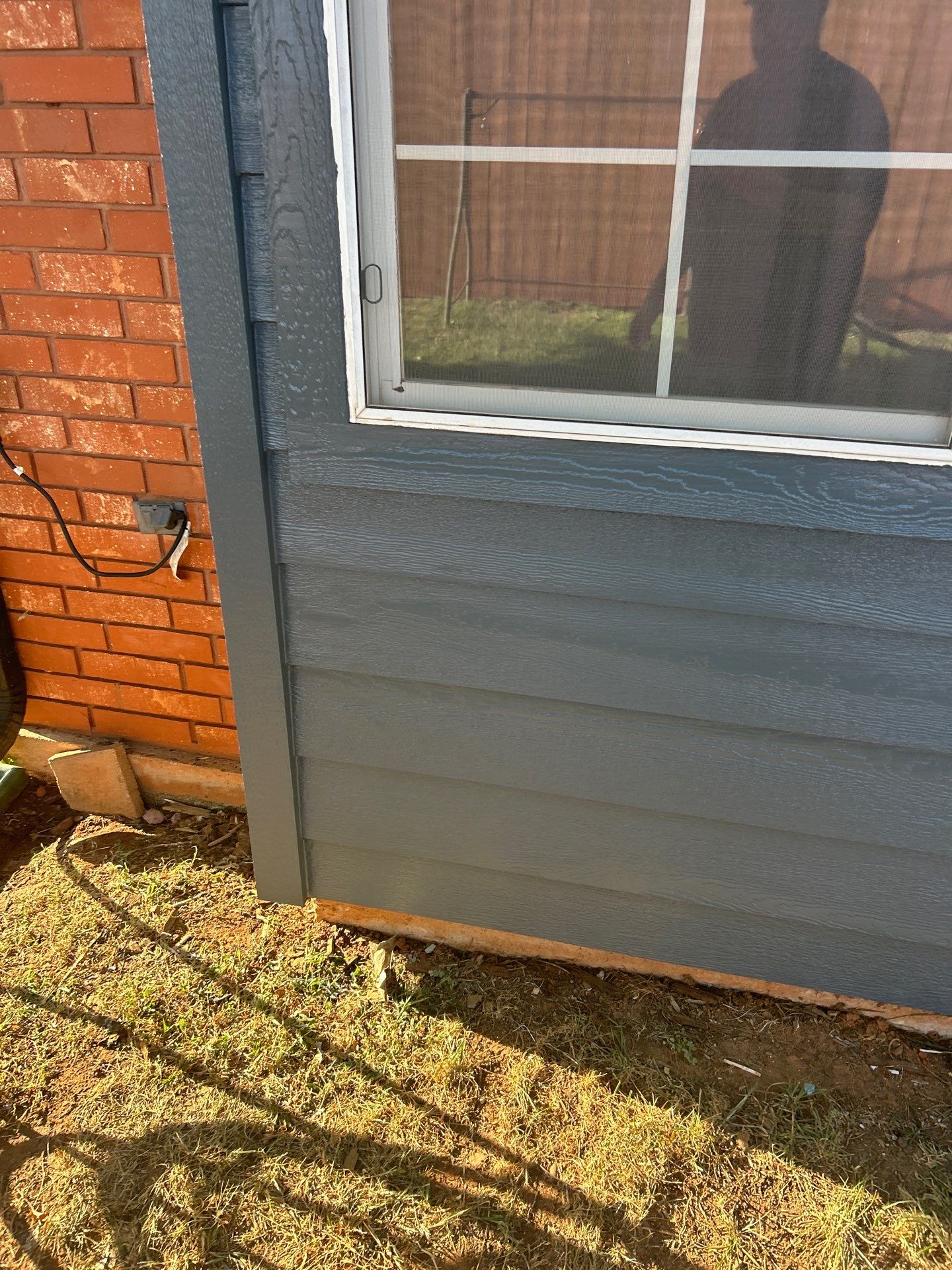 Siding Replacement and Exterior Painting in Edmond, OK by McCann's Roofing and Construction