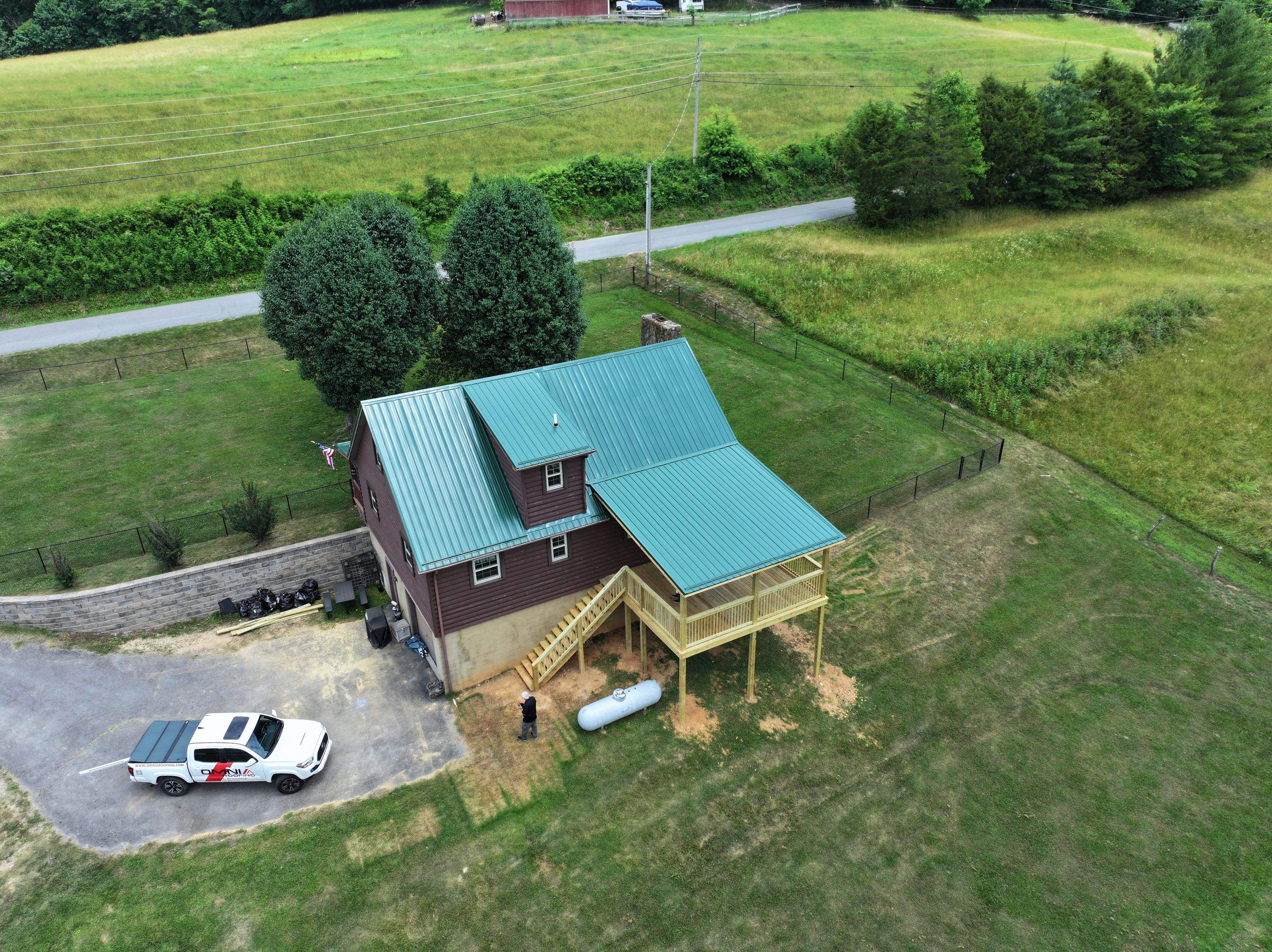 Paddle Creek Pet Ranch Cabin  by Omnia Roofing