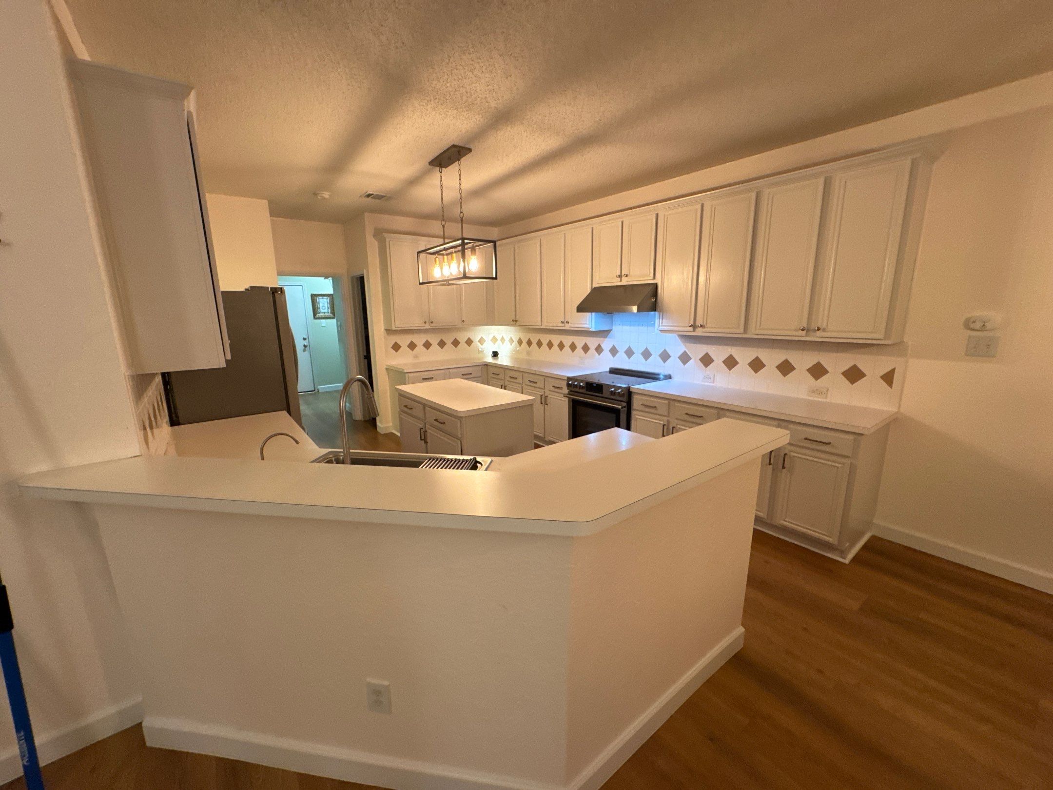 10-Day Luxury Kitchen: Custom Artistry & Waterfall Island Elegance by Tibi Soli LLC