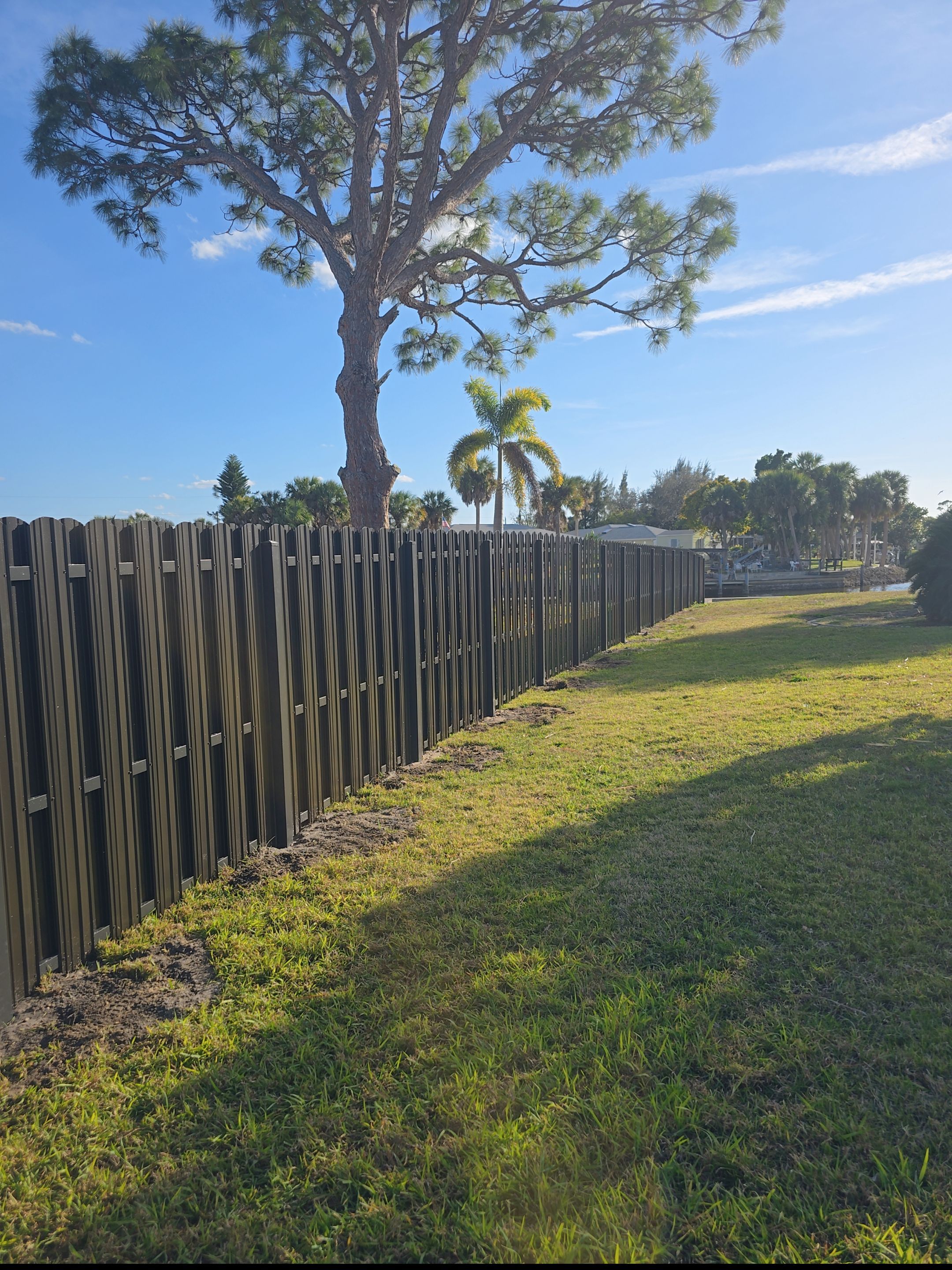 Bronze Metal Privacy Fence in Port Charlotte by True Fence LLC