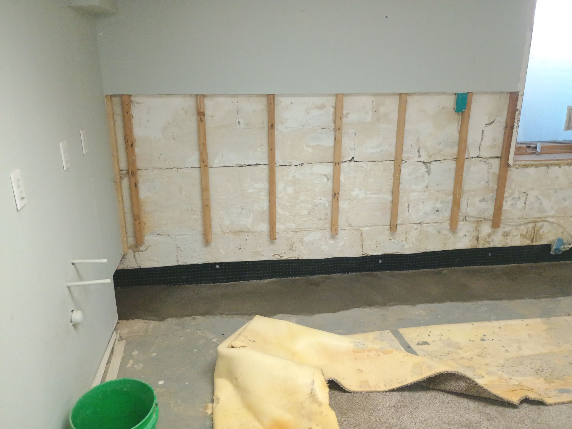 Interior Drain Tile Installation in South Minneapolis by Waterproofing Northeast