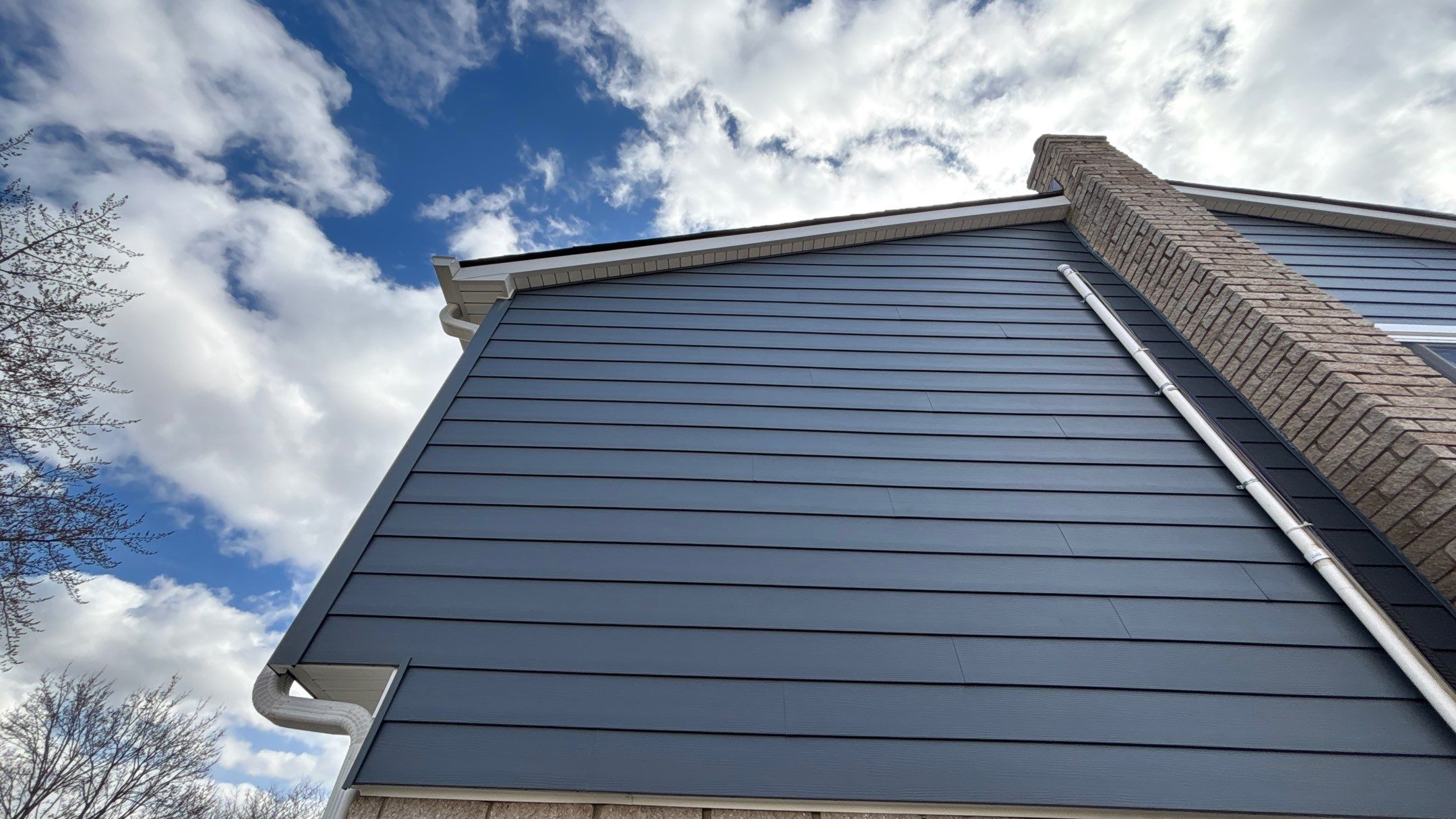 Siding Replacement using Alside Midnight Blue by 180 Contractors