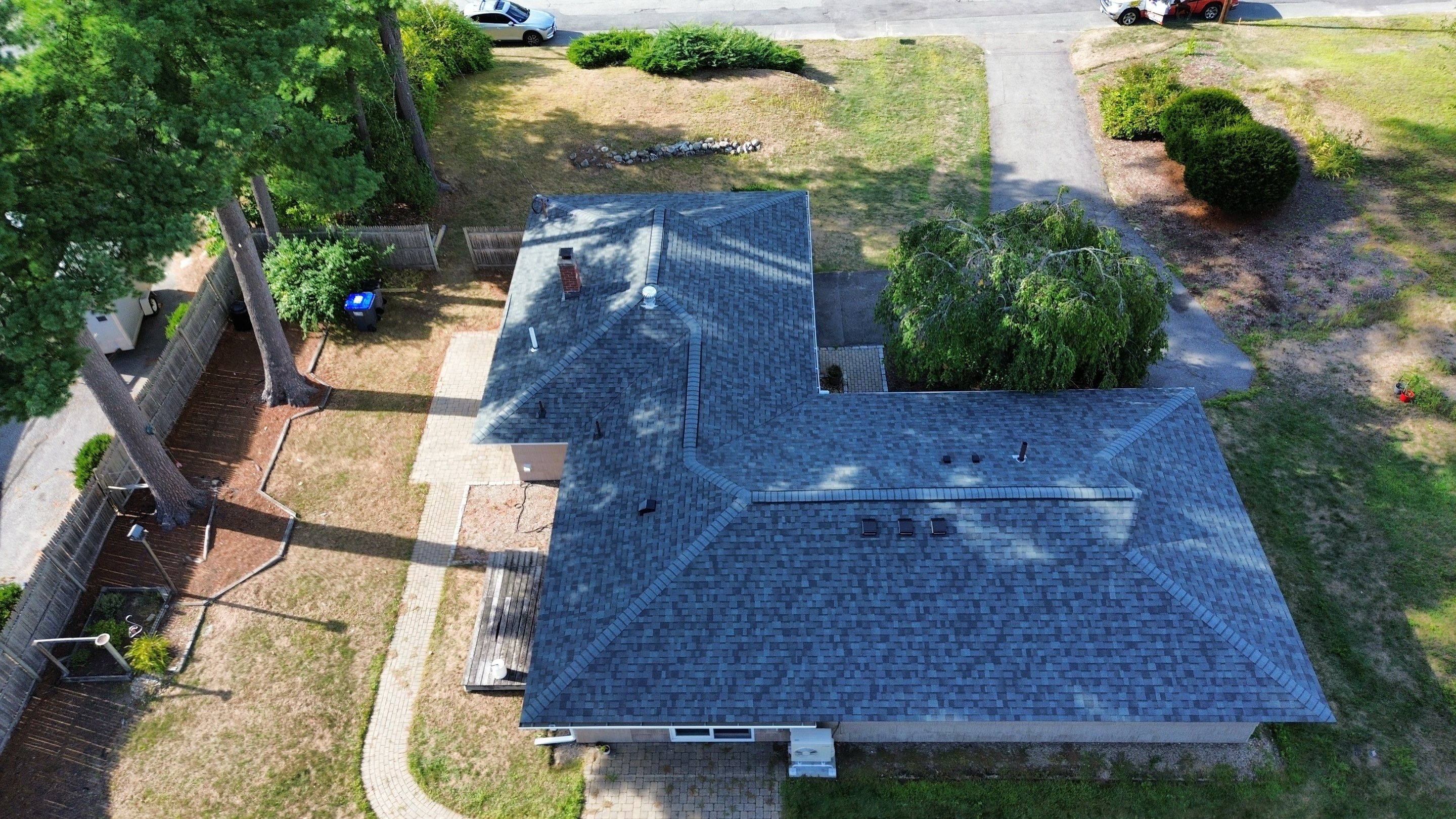 Roof Replacement & Gutter Installation – Chelmsford, MA by Mighty Dog Roofing of Greater Middlesex County