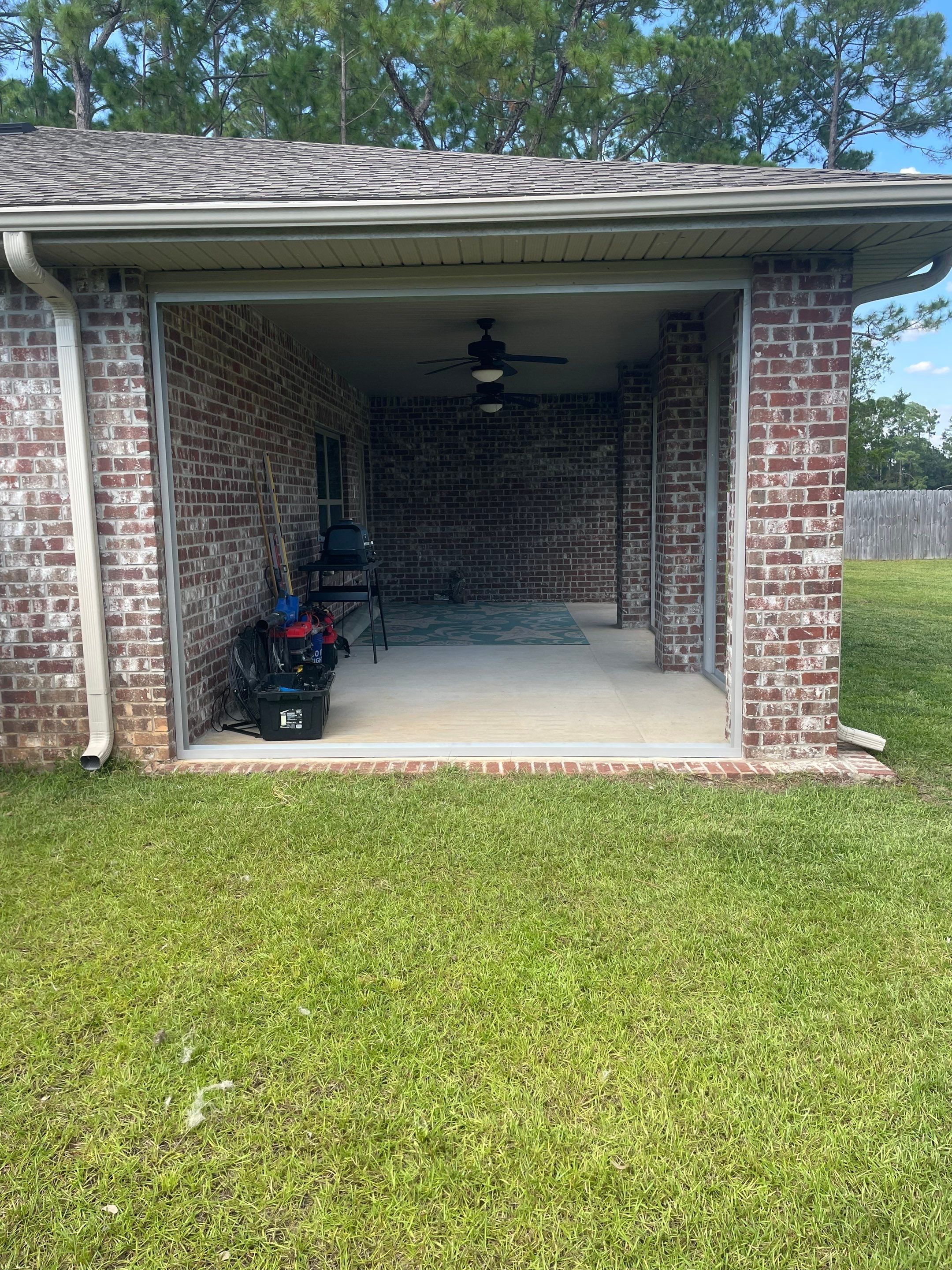 Glass Room Under Existing Patio Cover by Titan Sunrooms