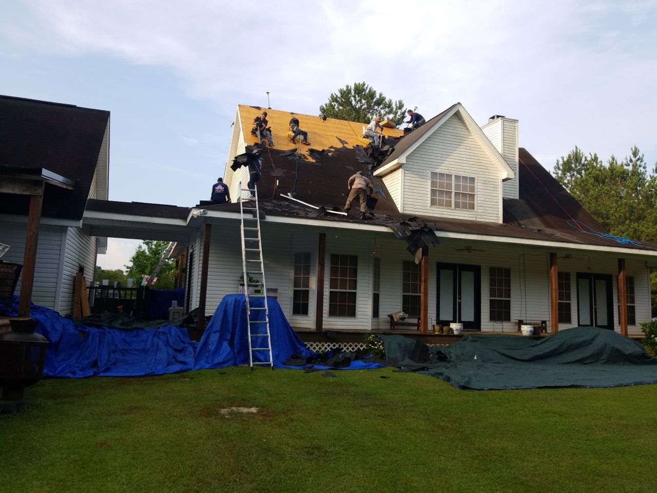Residential Roofing Installation using Roof Replacement by American Roofing & Construction LLC