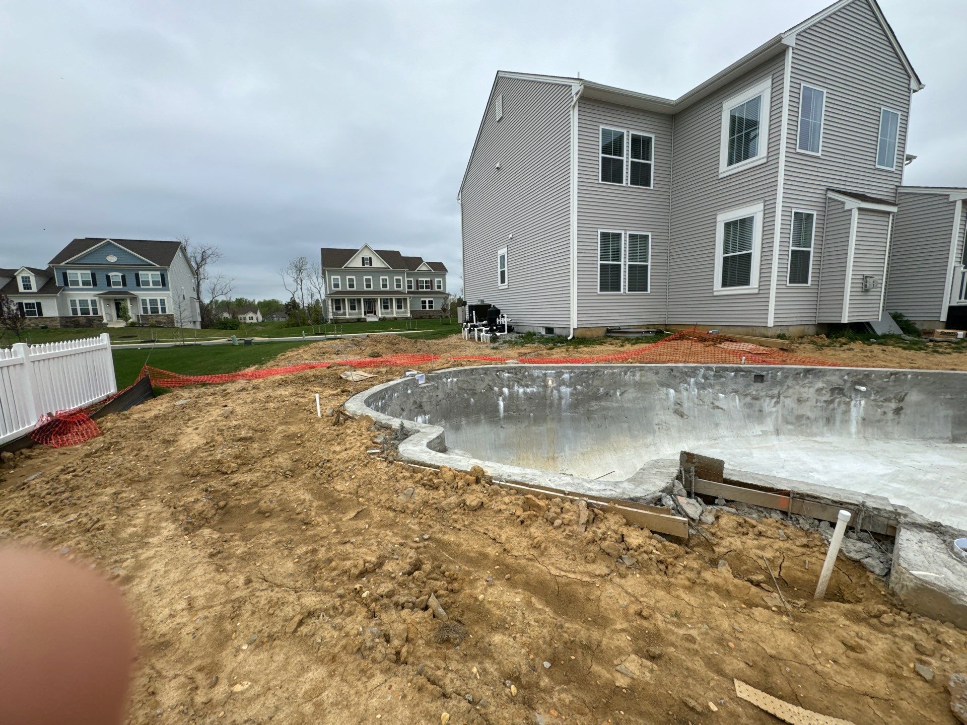 Pool and Hardscape Design in Delaware | Belgard Paver Patio & Outdoor Living Space by Studio G Indoor Spaces & Outdoor Living