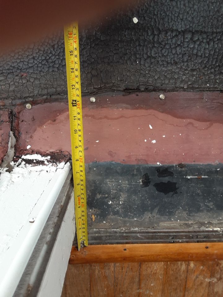 Residential Roof Replacement using Patio Roof by Absolute Roofing and Construction