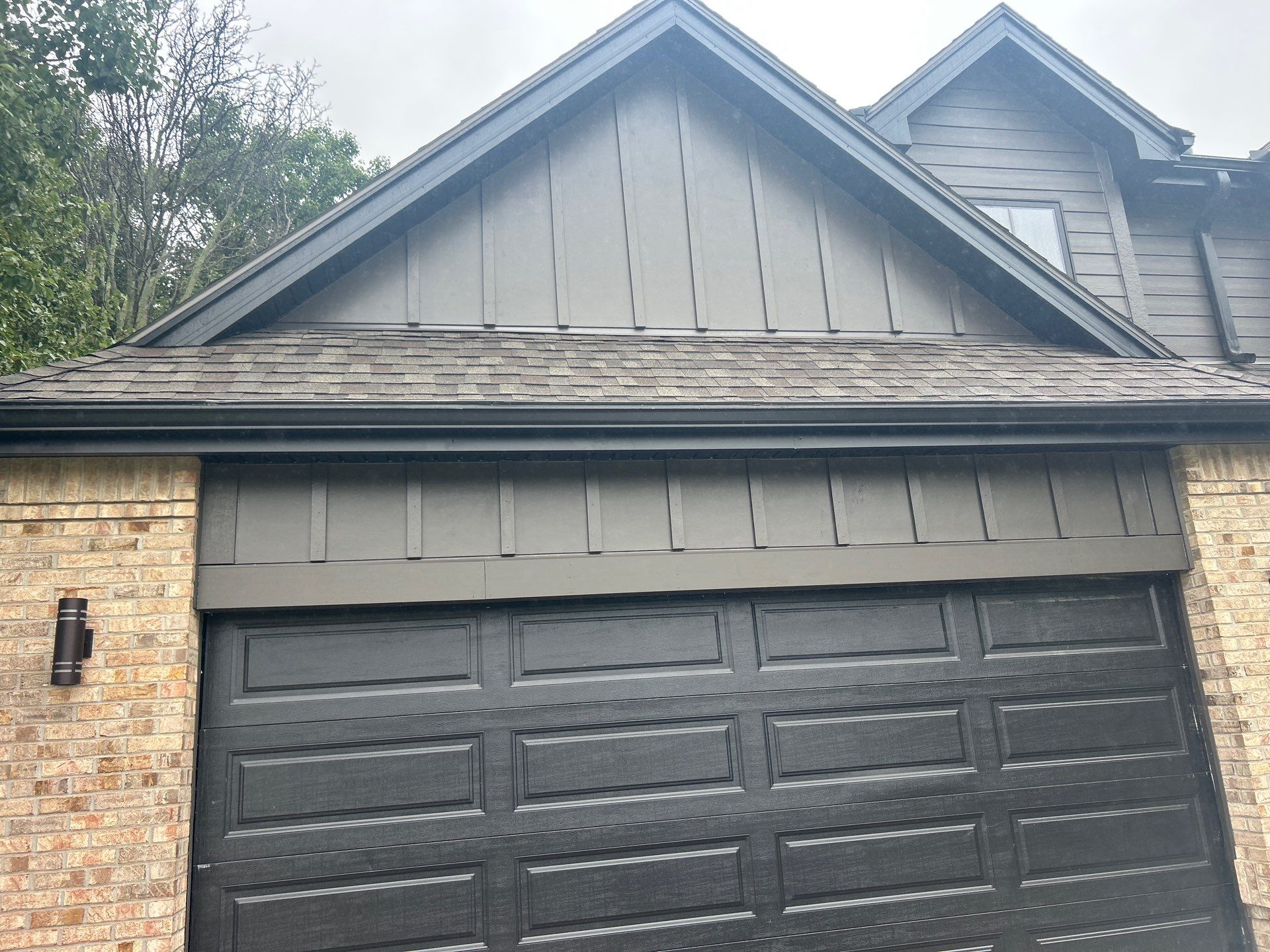 Marvin Window Replacement and Rich Espresso Hardie Siding Installation in Omaha by Carps Complete Exteriors
