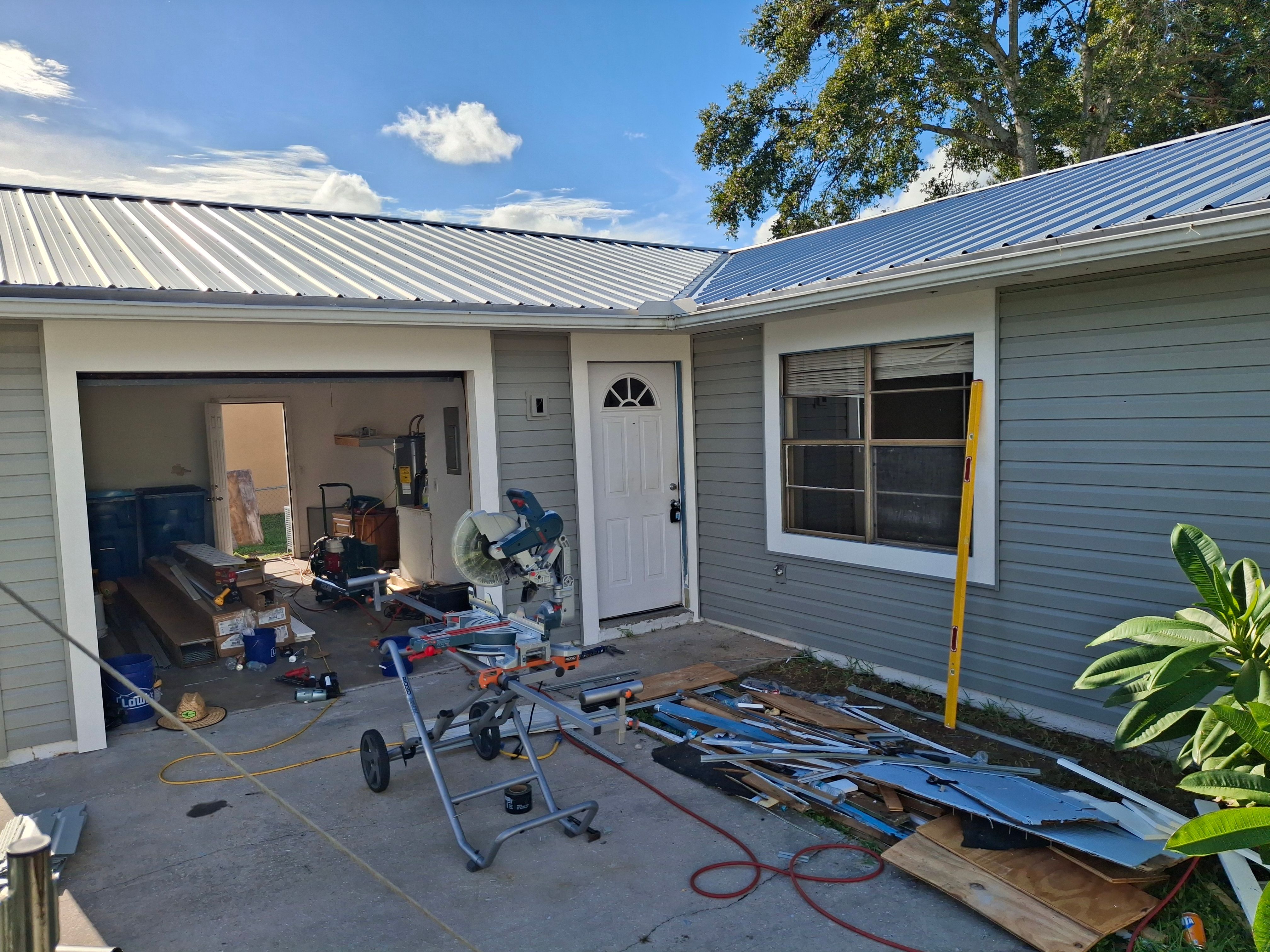 Vinyl Siding Installation and Structural Wood Rot Repair in Palm Bay by Florida Roofing and Renovations Inc.