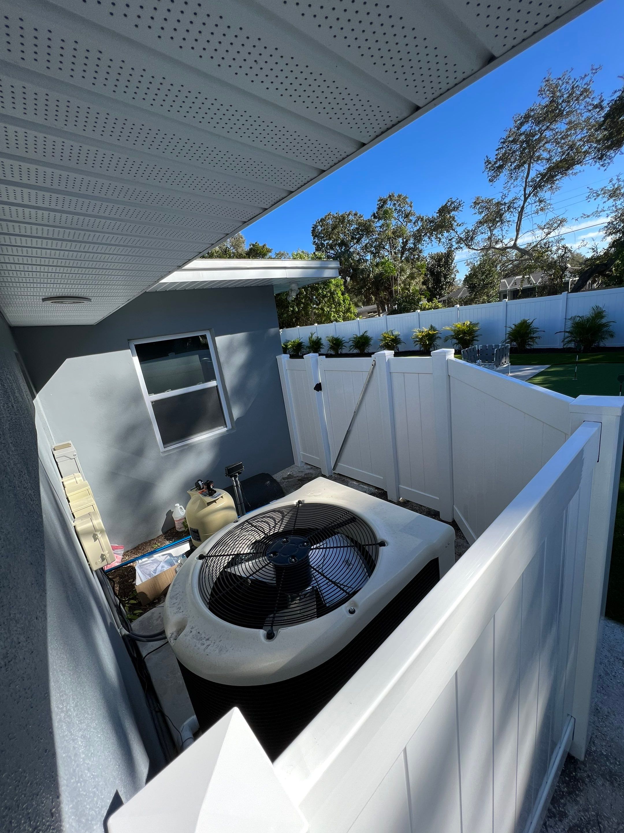 Vinyl Privacy Fence With AC Enclosure and Storage Corral by Asap fence and gates, LLC