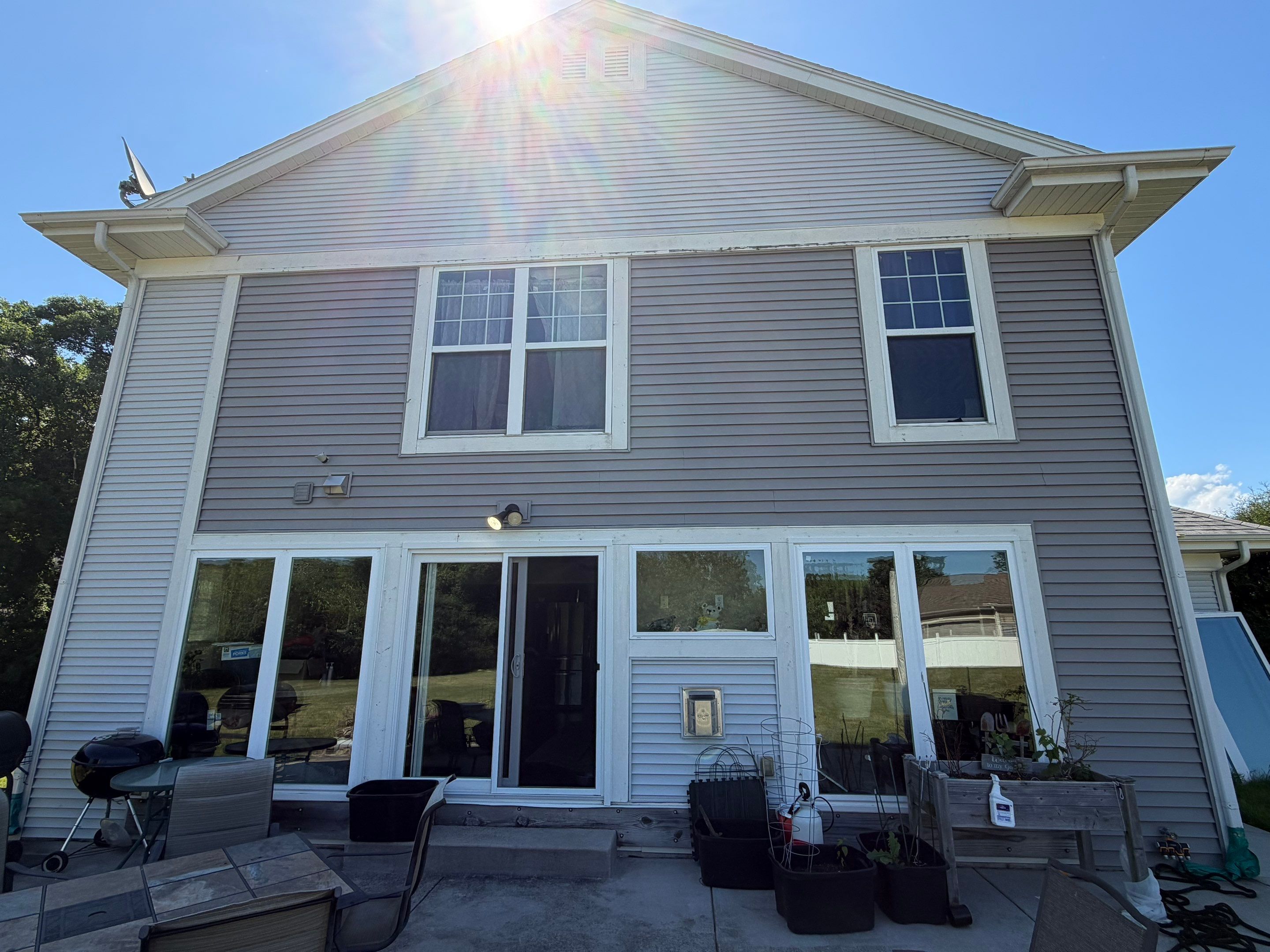 Vinyl Siding Replacement and Multi-Room Interior Renovation in Milwaukee by OCS Contracting Services