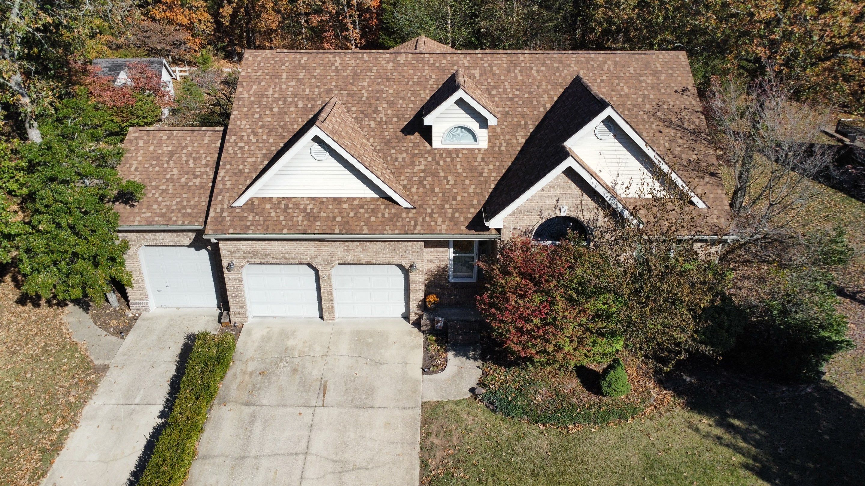 Residential Roof + Gutters & Downspouts & Gutter Guards  by Titan Commercial & Residential Roofing 