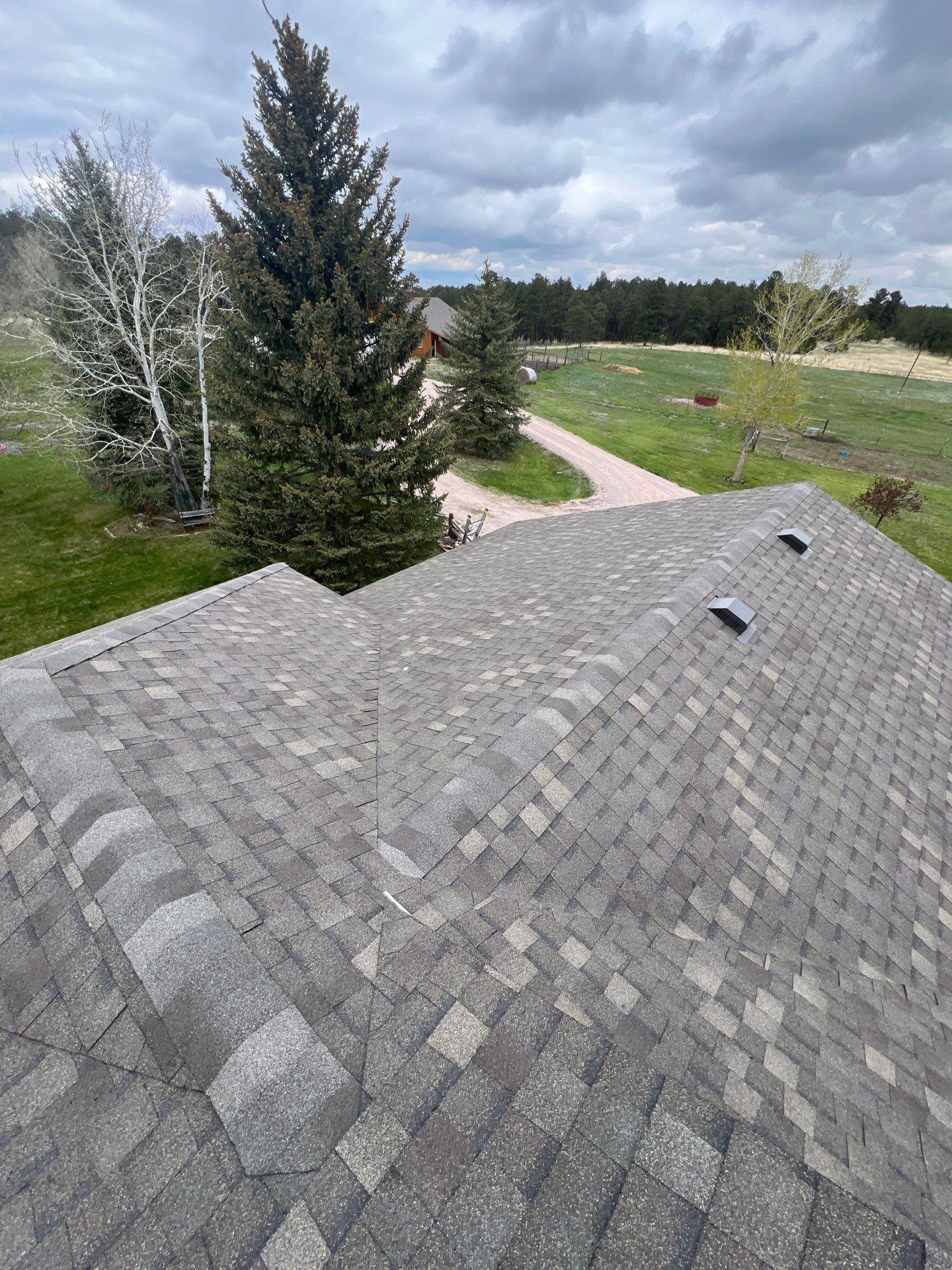 Residential Roofing Installation using Atlas Pinnacle Impact Weathered Wood by Blue Peaks Roofing LLC 