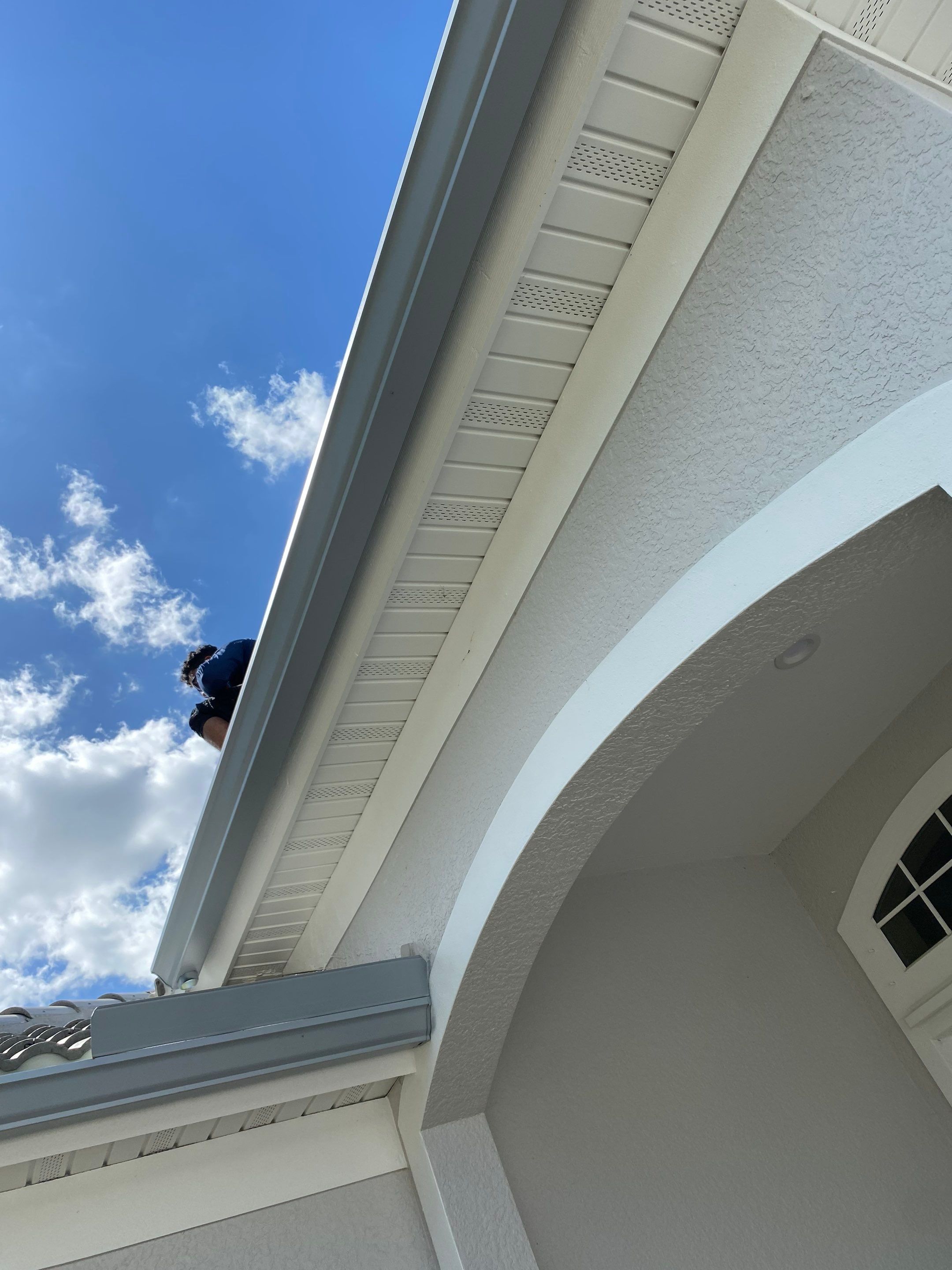 6-inch K-style Seamless Gutters and Splash Guard in Grey Color in Naples FL by Gutter Professors