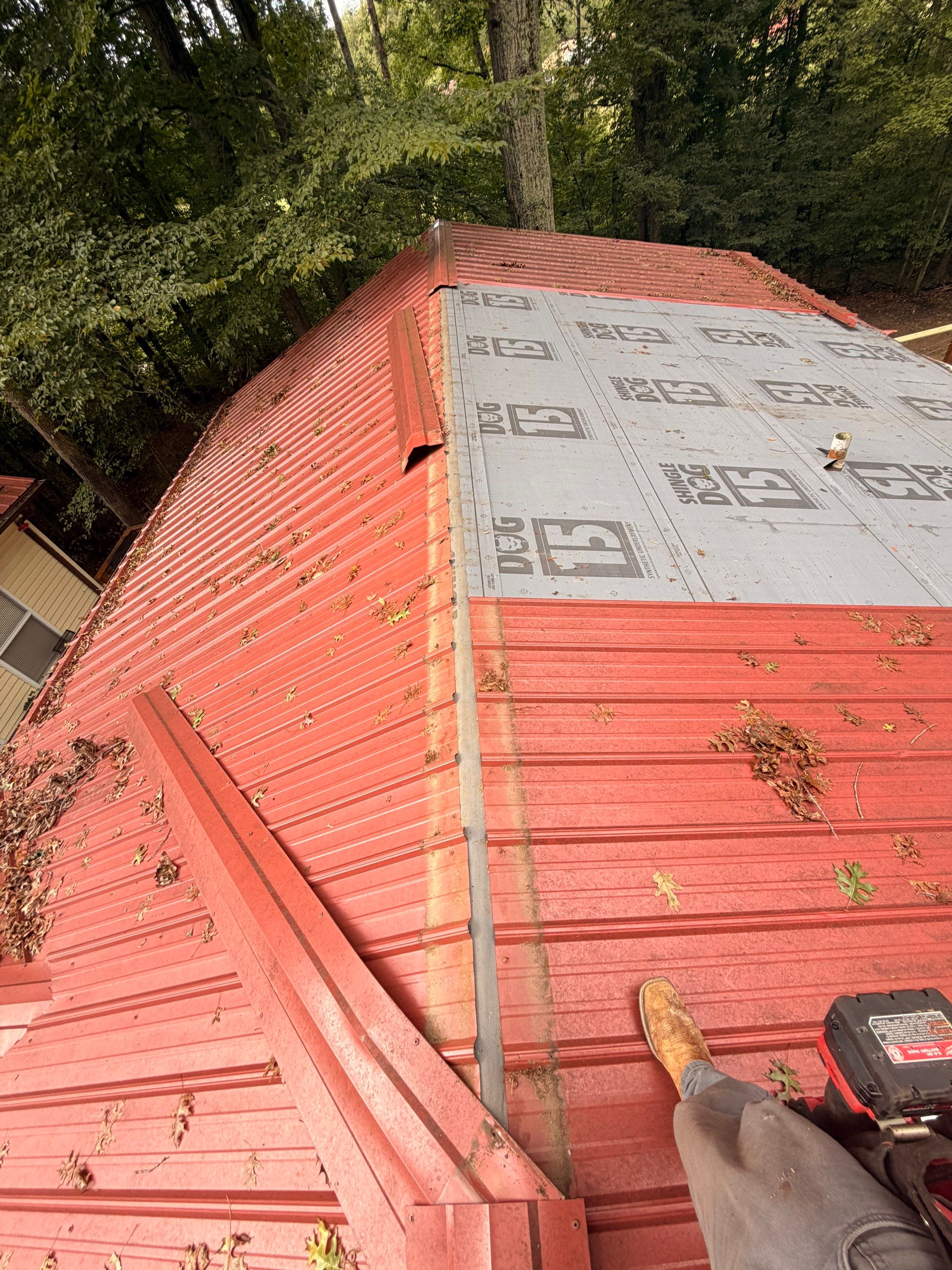 Red Metal Roof Restoration and Wood Fascia Replacement in Barboursville by Cade Construction