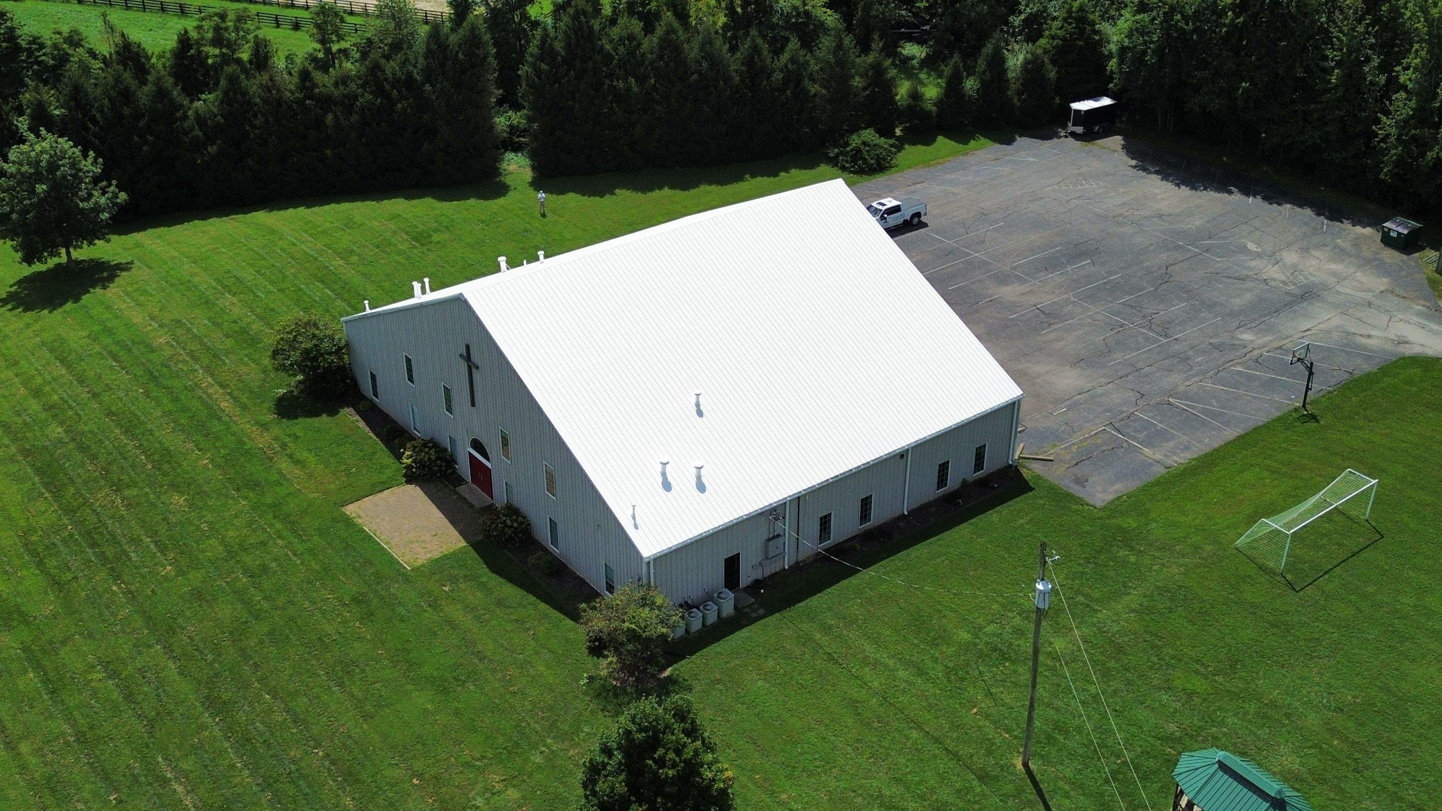 Metal Roof Restoration by Commercial Roofing Pros