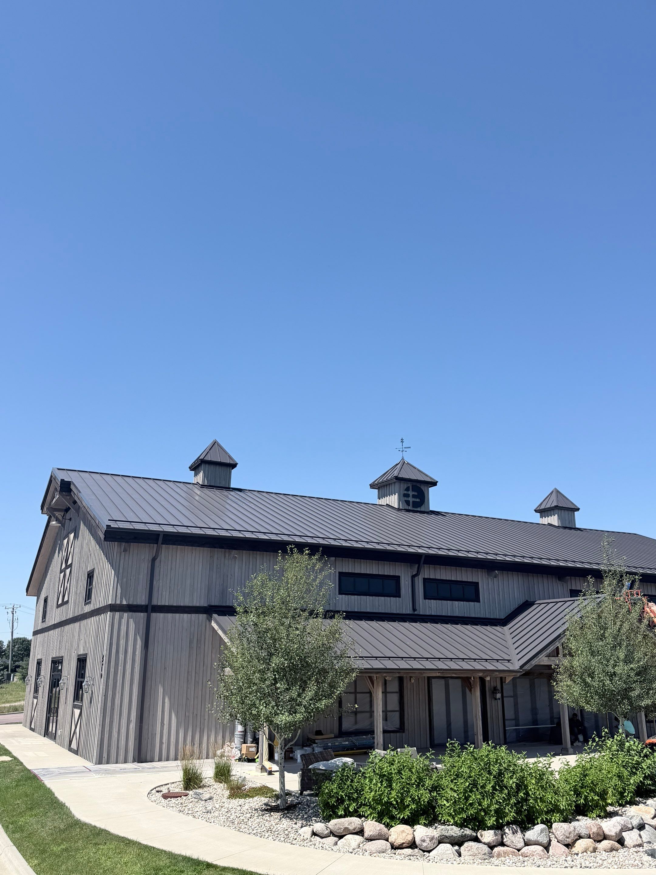 Commercial Exterior Wood Staining for Sanford Barn in Sioux Falls by Select Painting, Coatings & Garage Cabinets