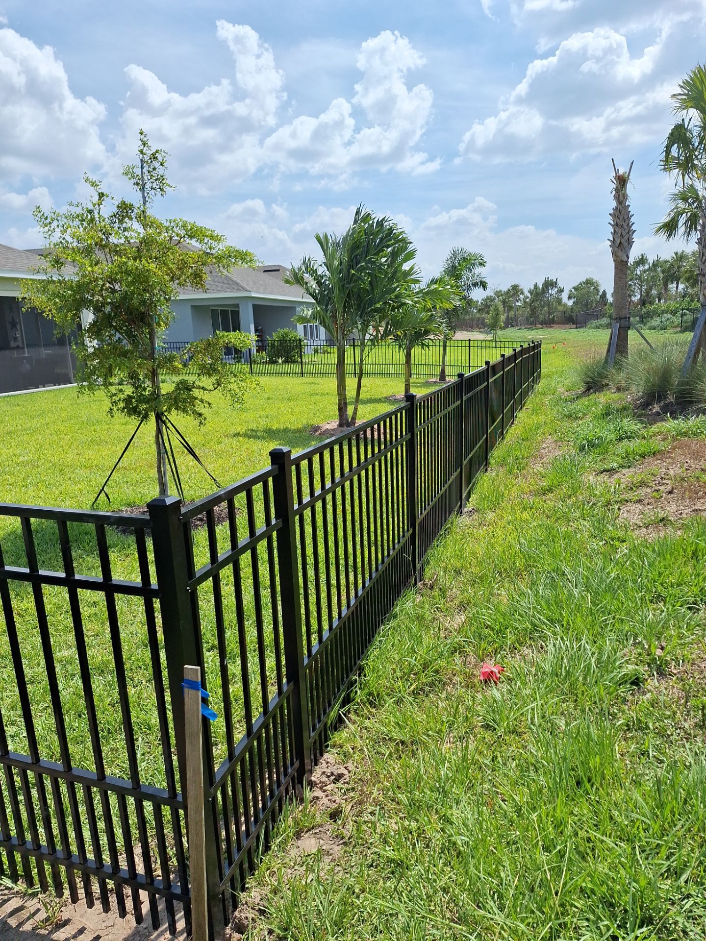 Aluminum Fence Installation using Black 3 Rail Aluminum Fence by Asap fence and gates, LLC